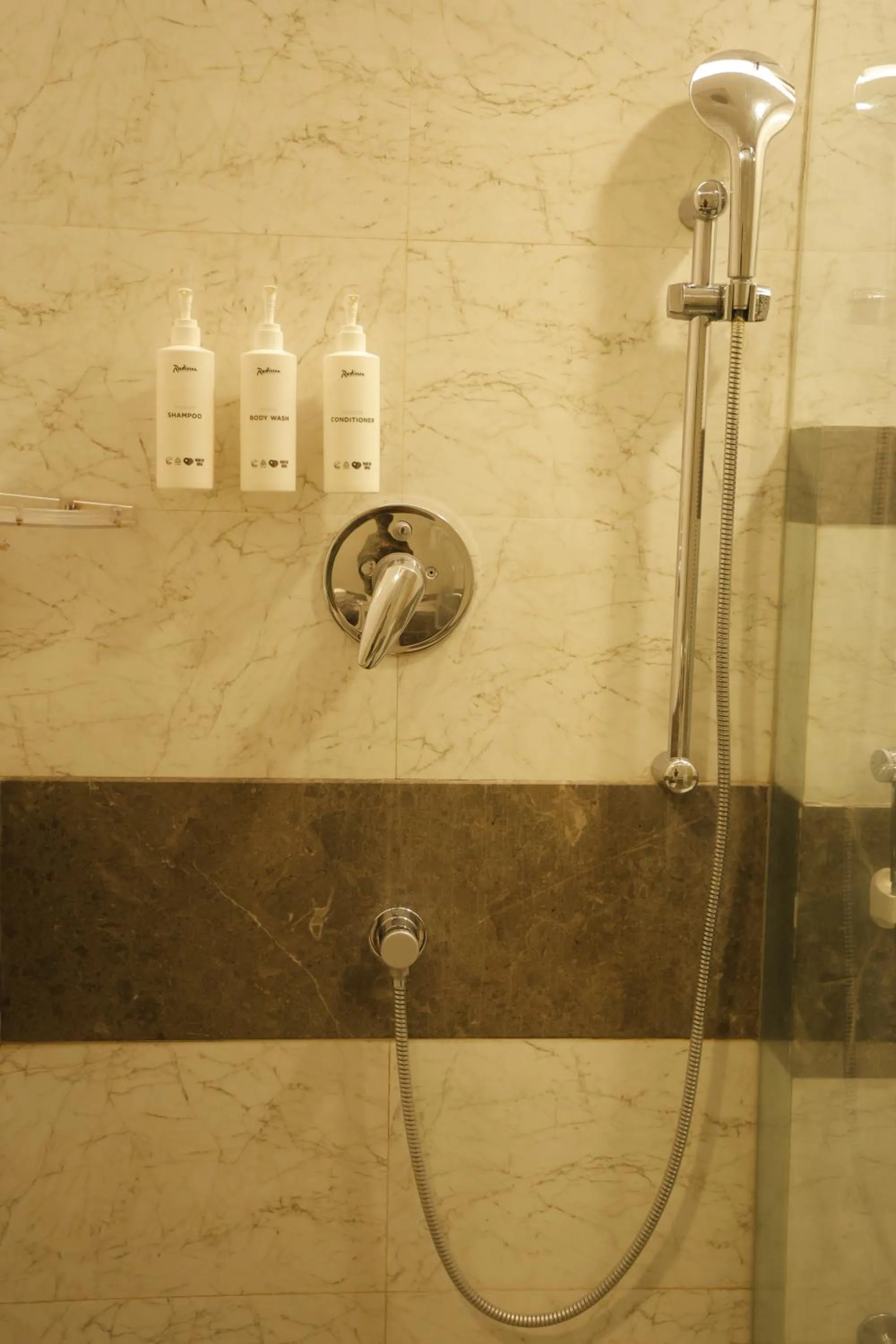 Shower in Radisson Resort & Spa Kandla