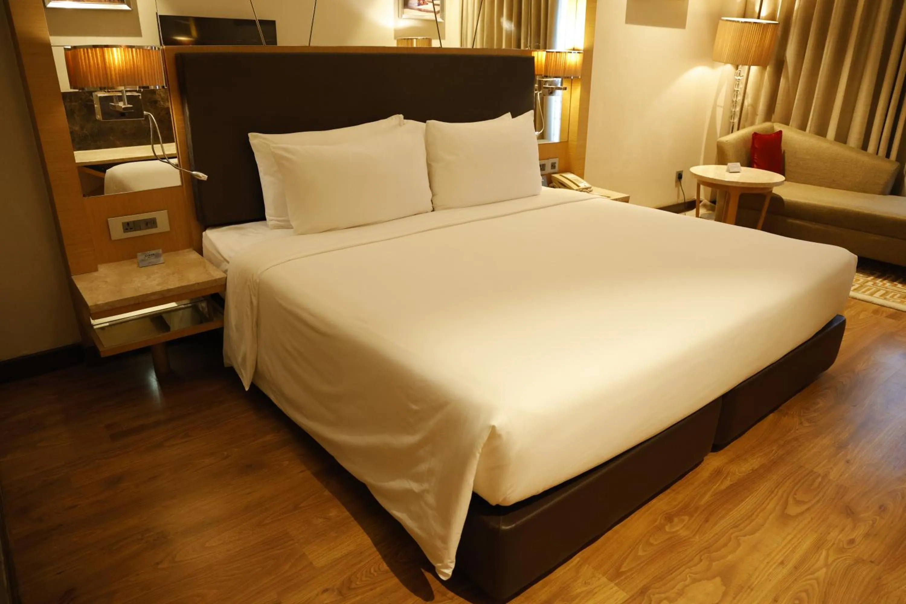 Bed in Radisson Resort & Spa Kandla