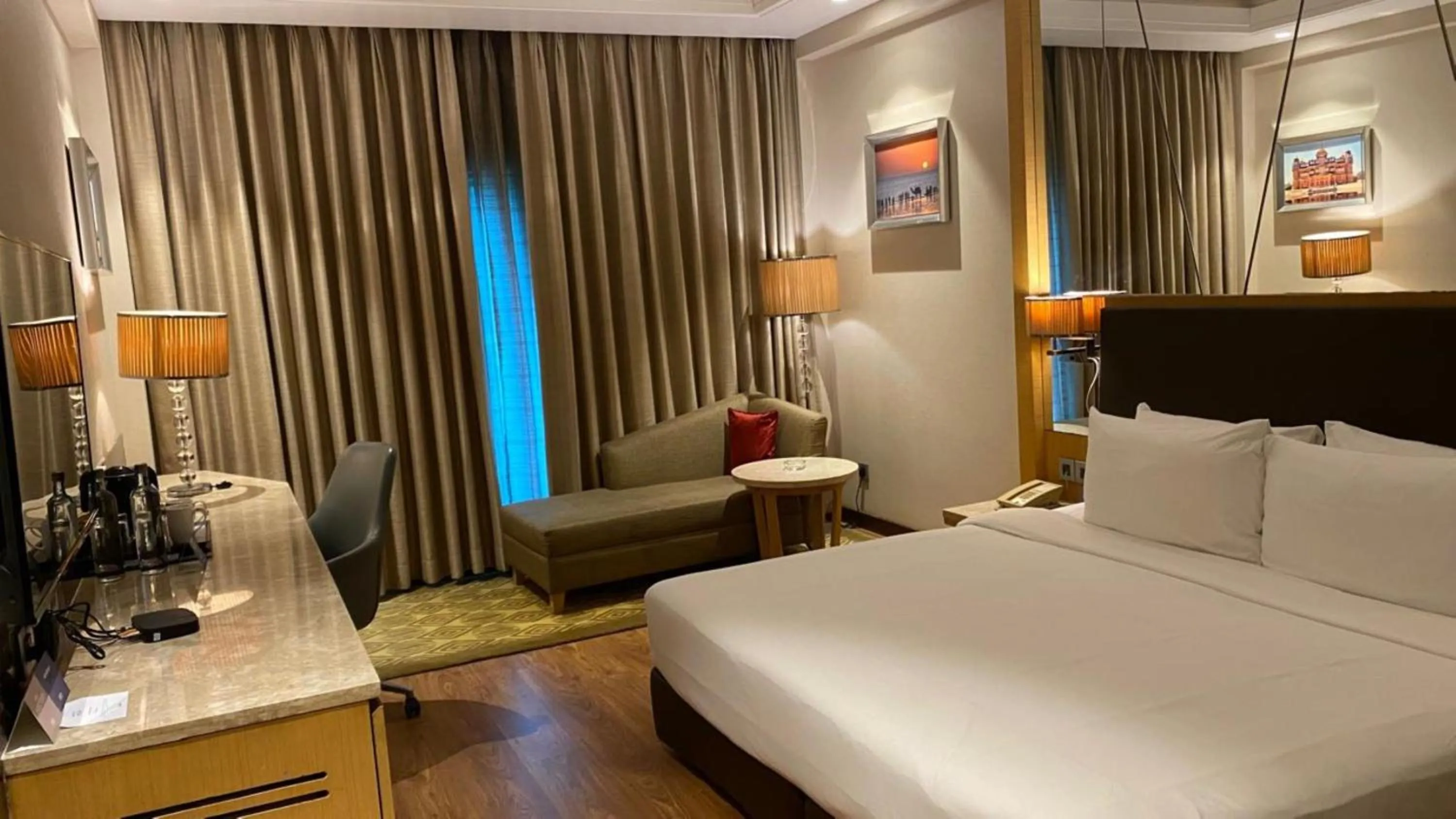 Living room, Bed in Radisson Resort & Spa Kandla