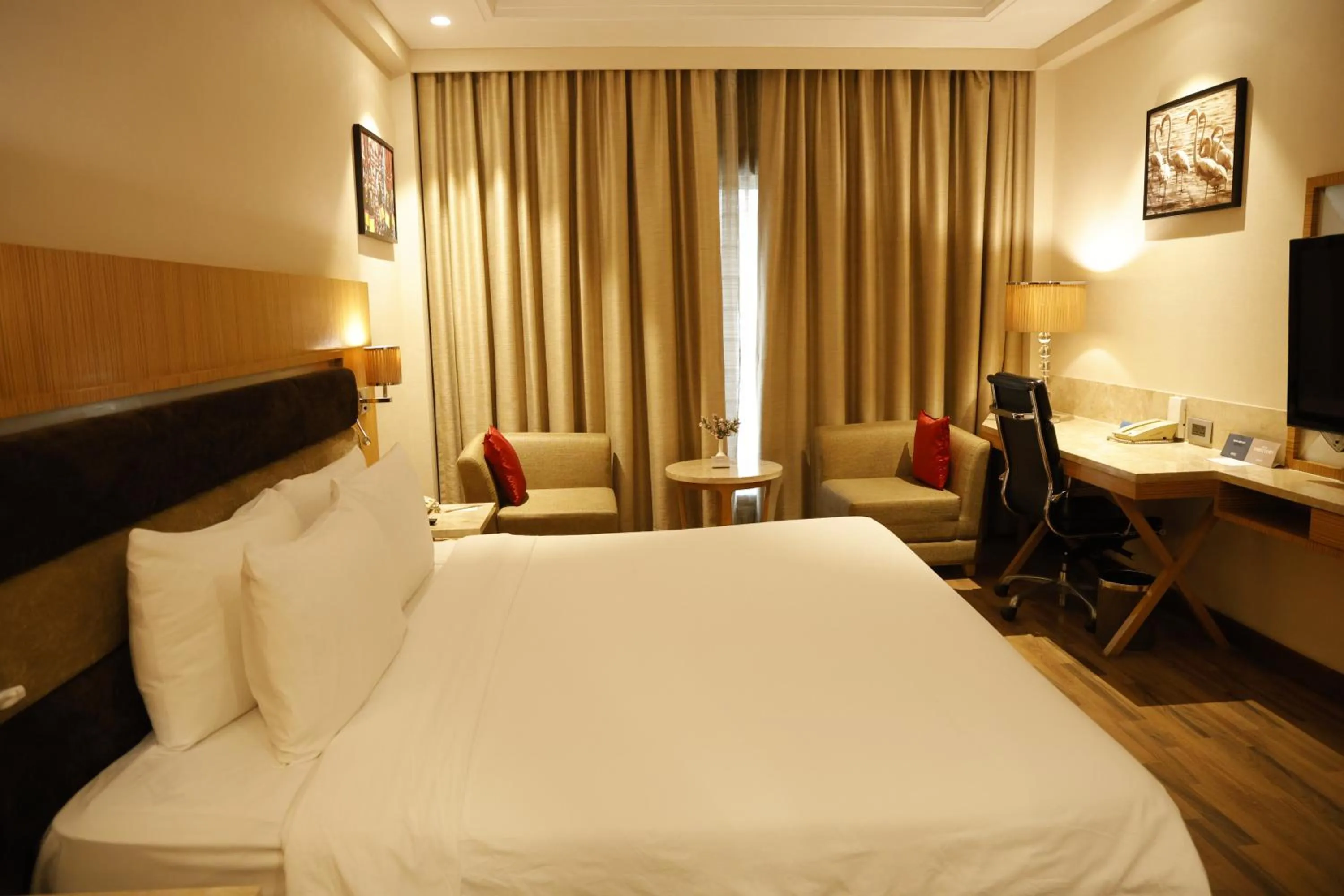 Bed in Radisson Resort & Spa Kandla