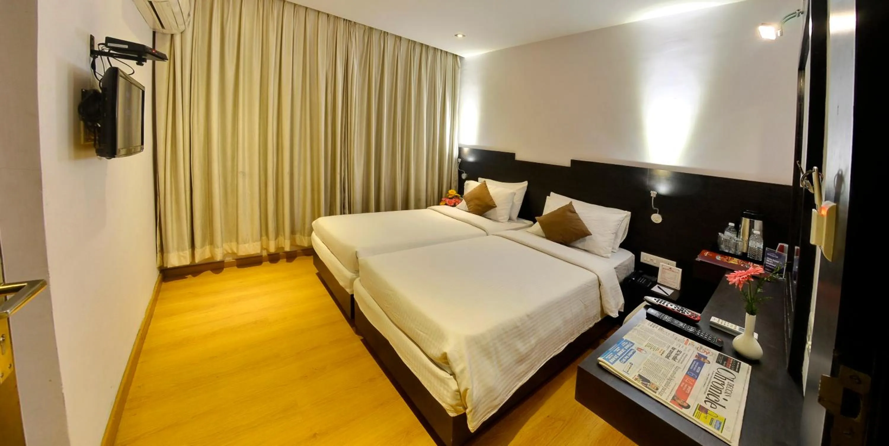 Photo of the whole room, Bed in Hotel Gokulam Park