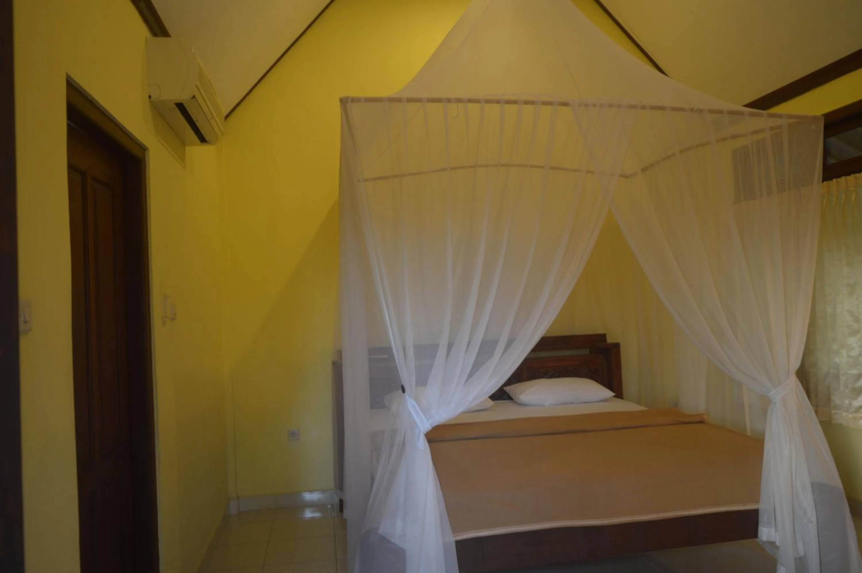 Bed in Kangkung Cottages