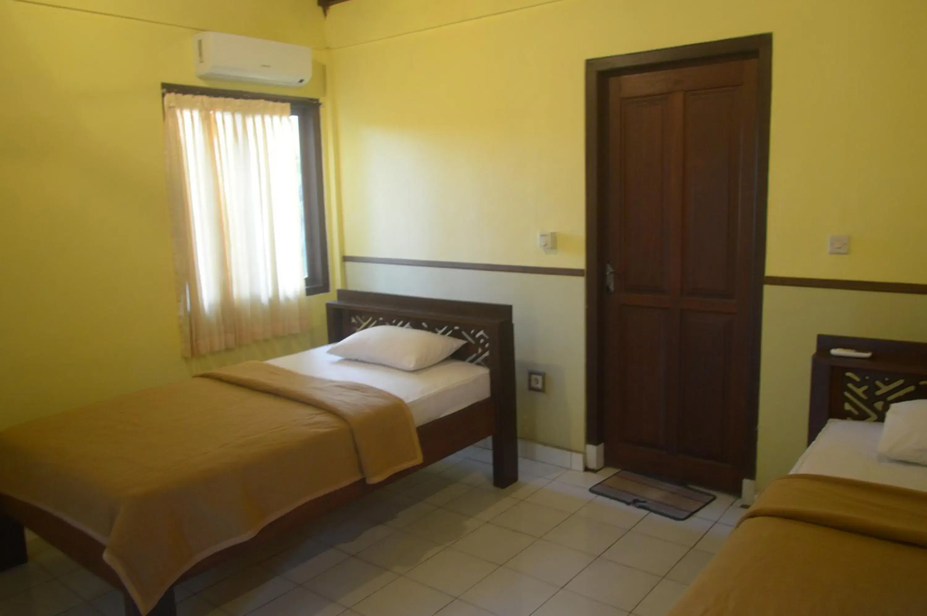 Bed in Kangkung Cottages Bed in Kangkung Cottages