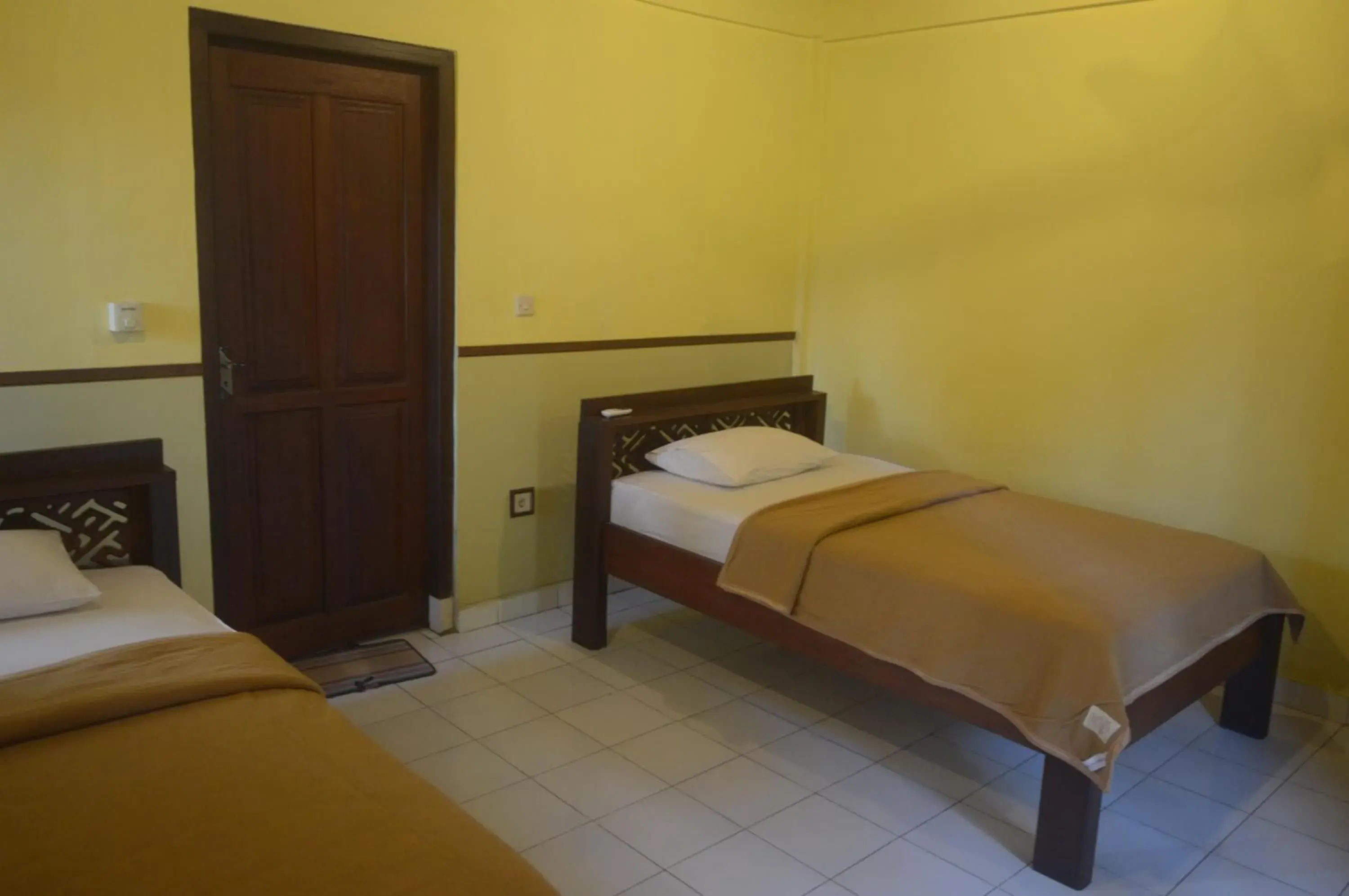 Bed in Kangkung Cottages Bed in Kangkung Cottages