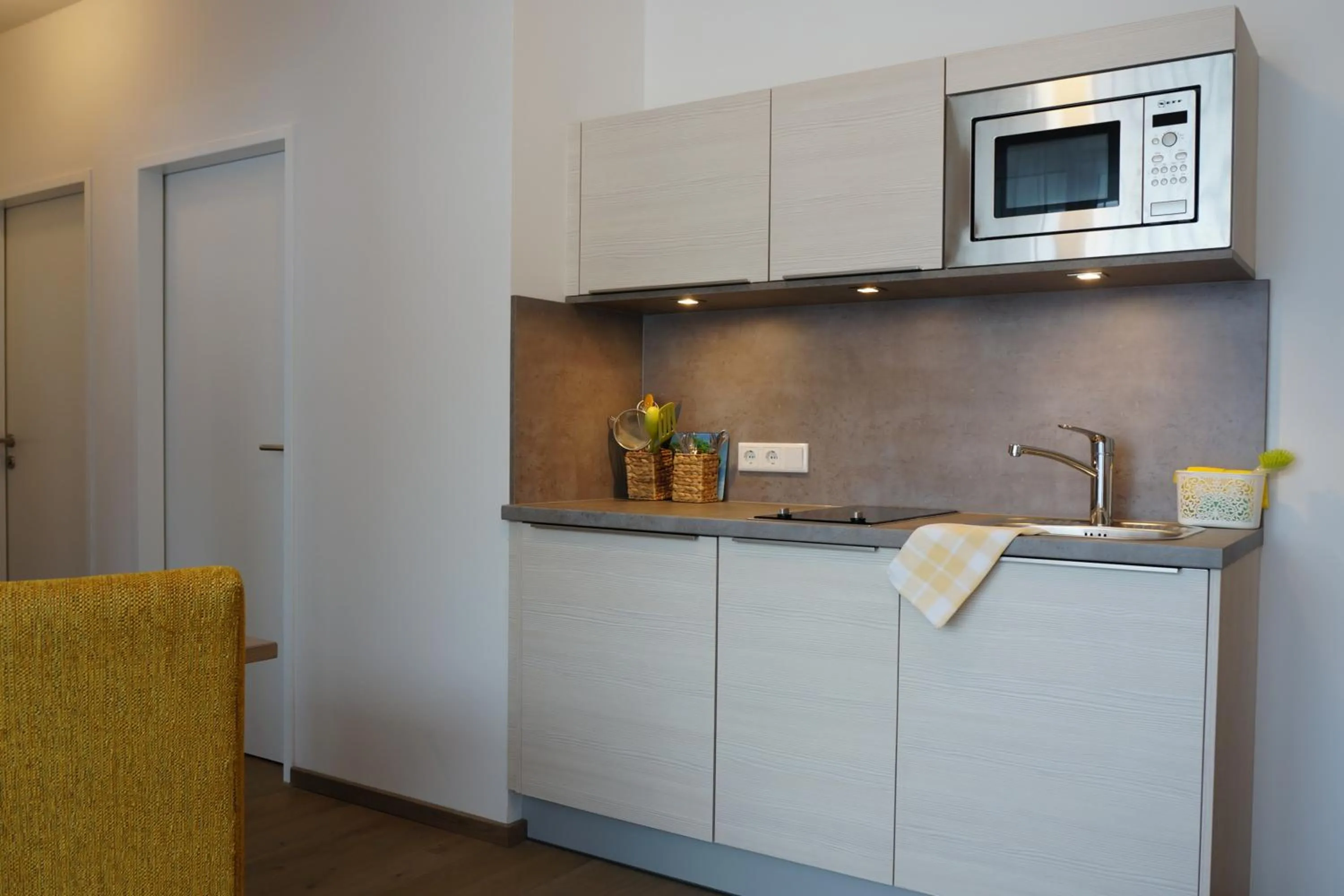 Kitchen or kitchenette in Aparthotel Bergtraum
