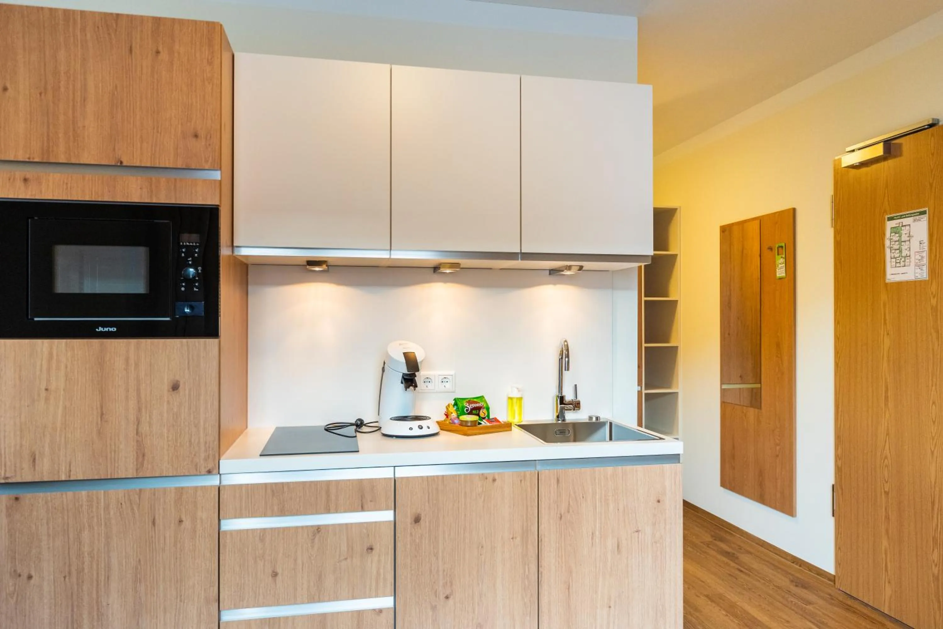 Kitchen or kitchenette in INhouse - Wohnen auf Zeit