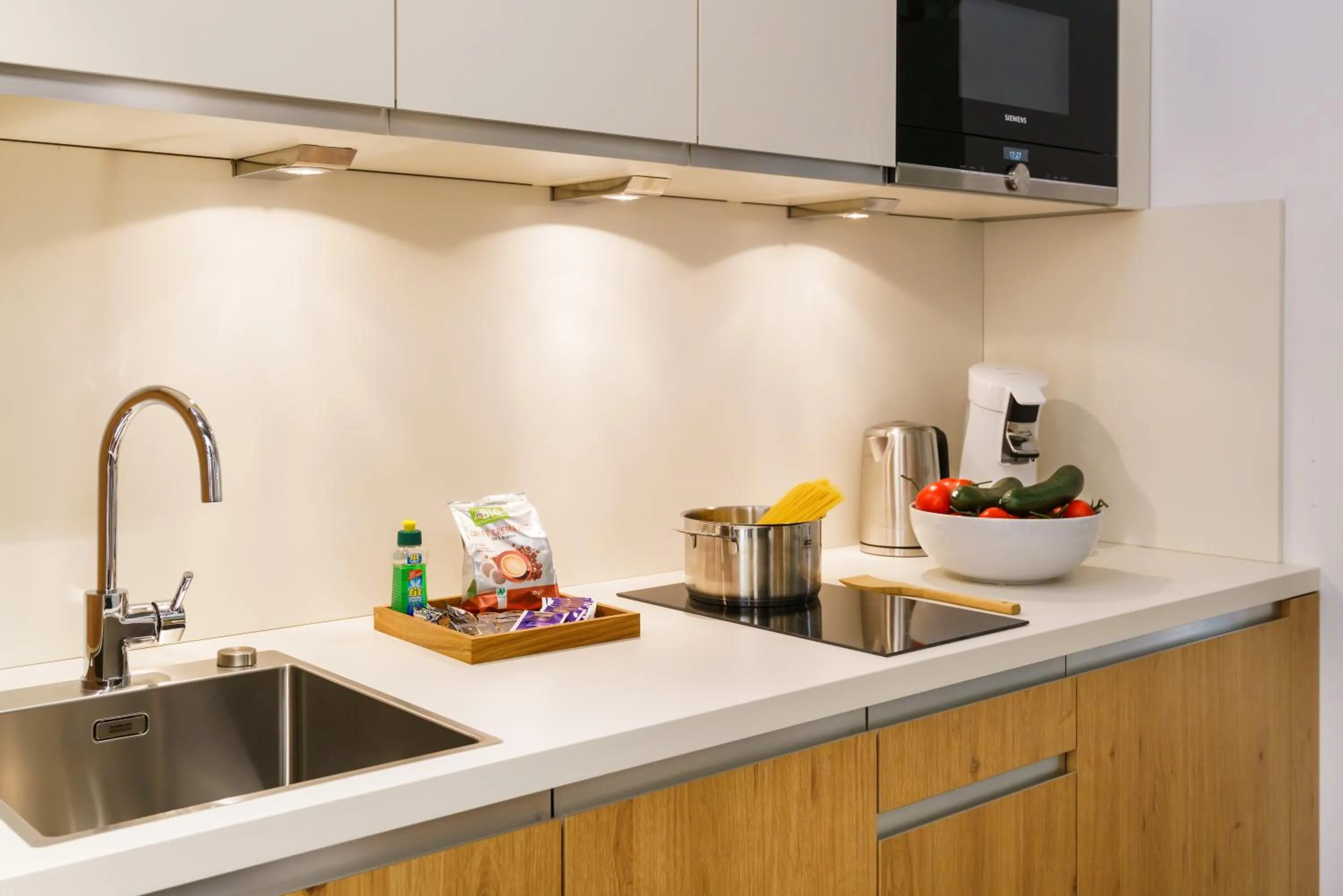 Kitchen or kitchenette in INhouse - Wohnen auf Zeit