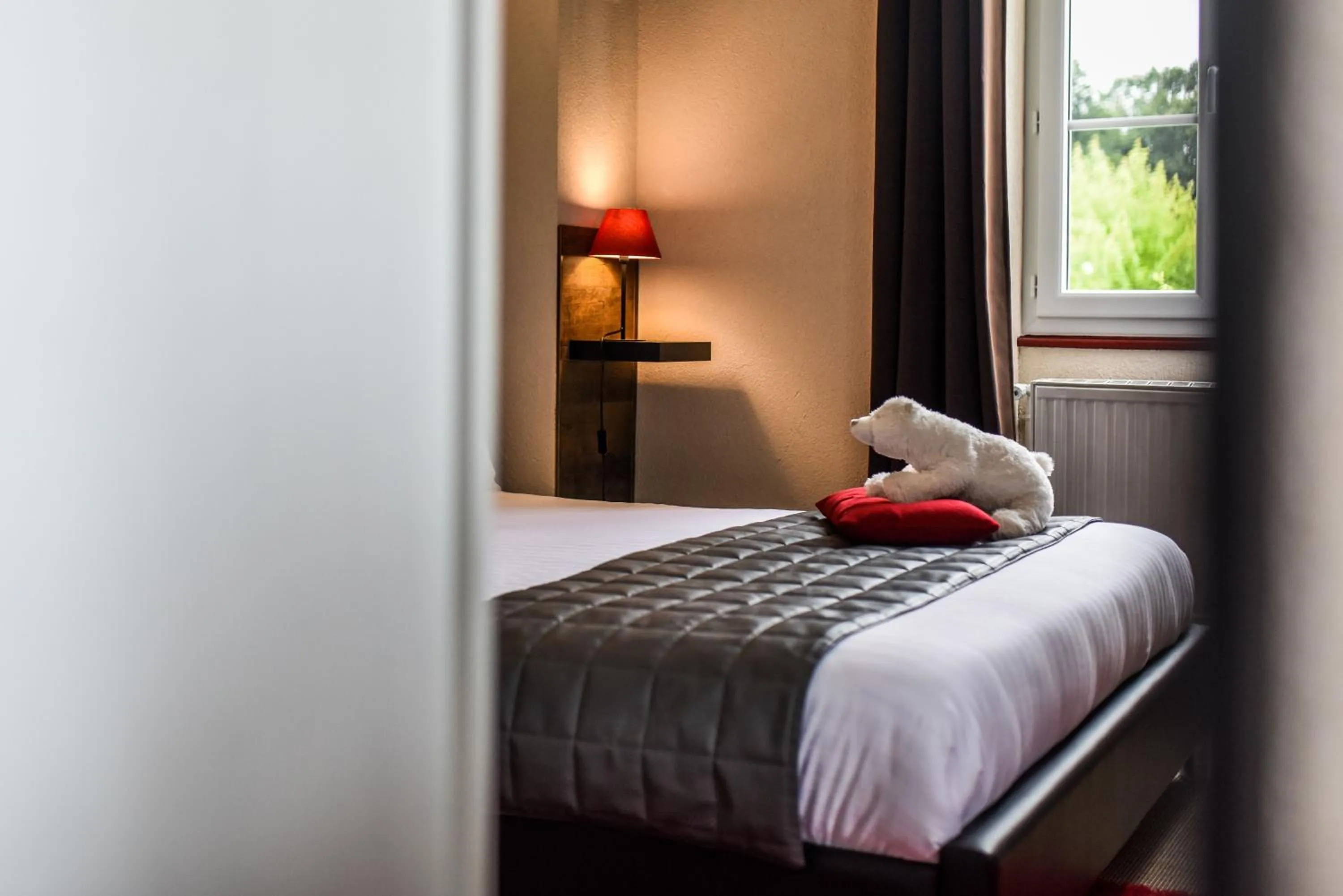 Bed in Hôtel Auberge l'Estanquet