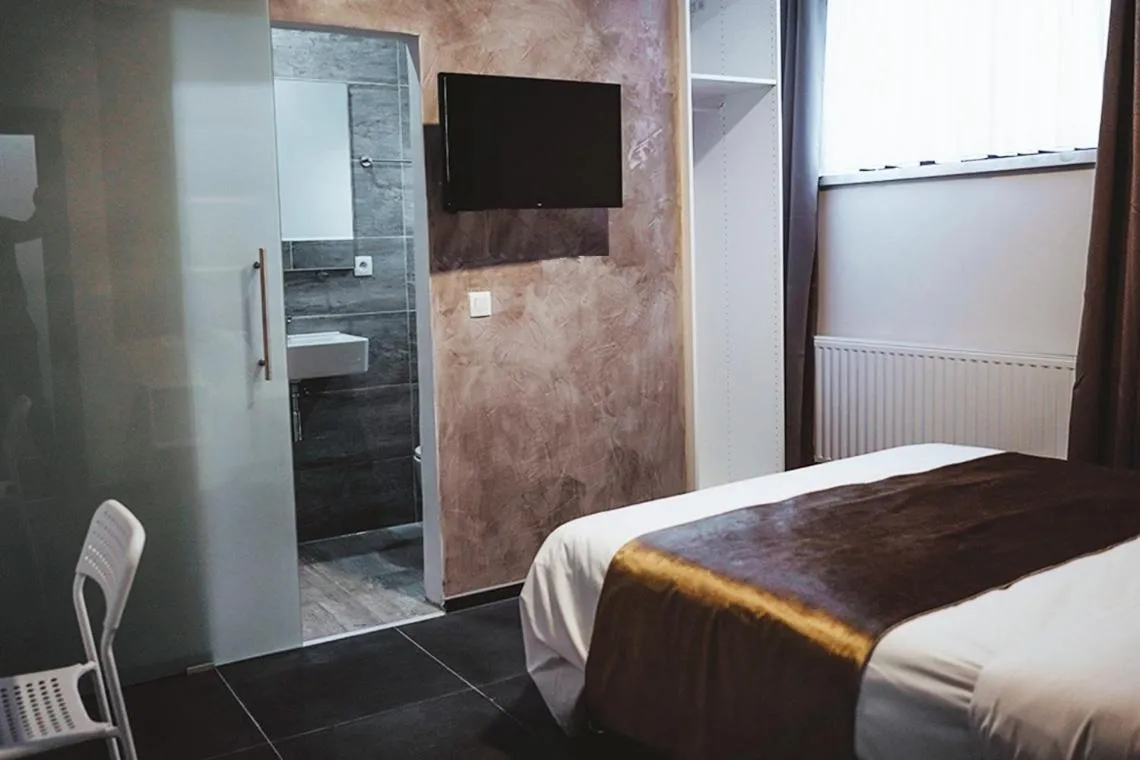 Bed in Hôtel onyx expo