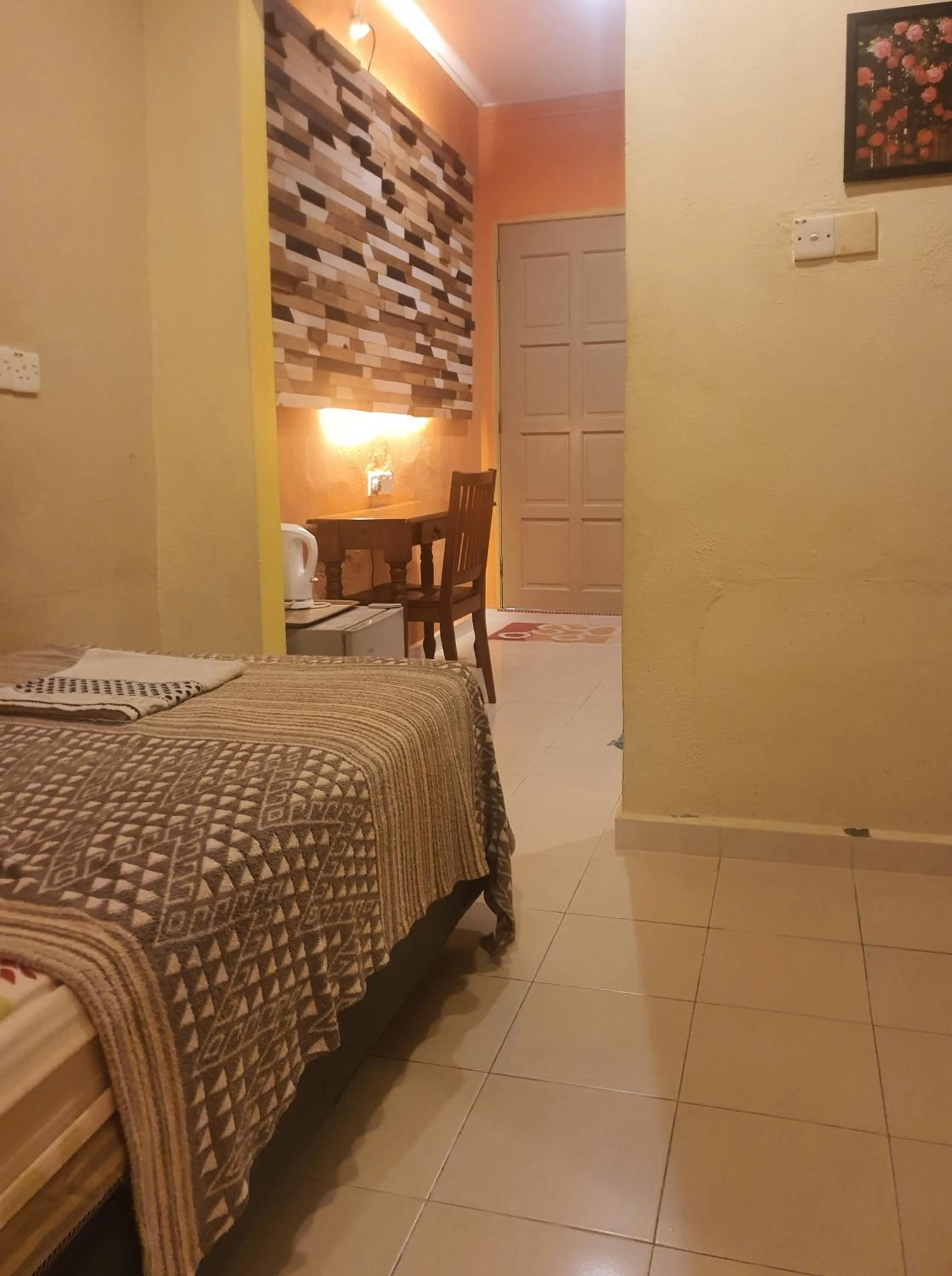 Bed in THE COTTAGE LANGKAWI