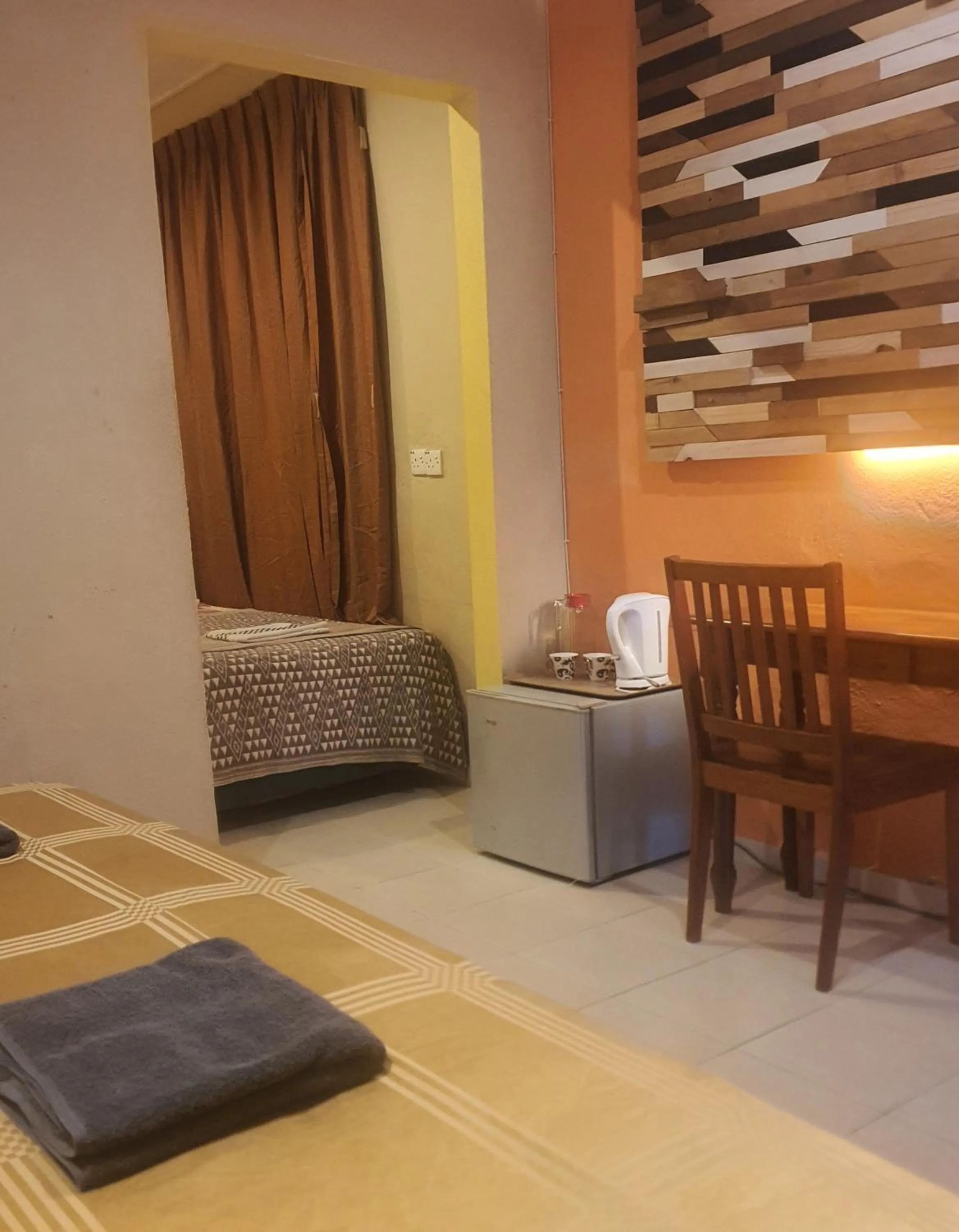 Bed in THE COTTAGE LANGKAWI