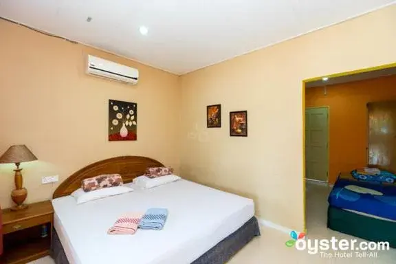 Bed in THE COTTAGE LANGKAWI Bed in THE COTTAGE LANGKAWI