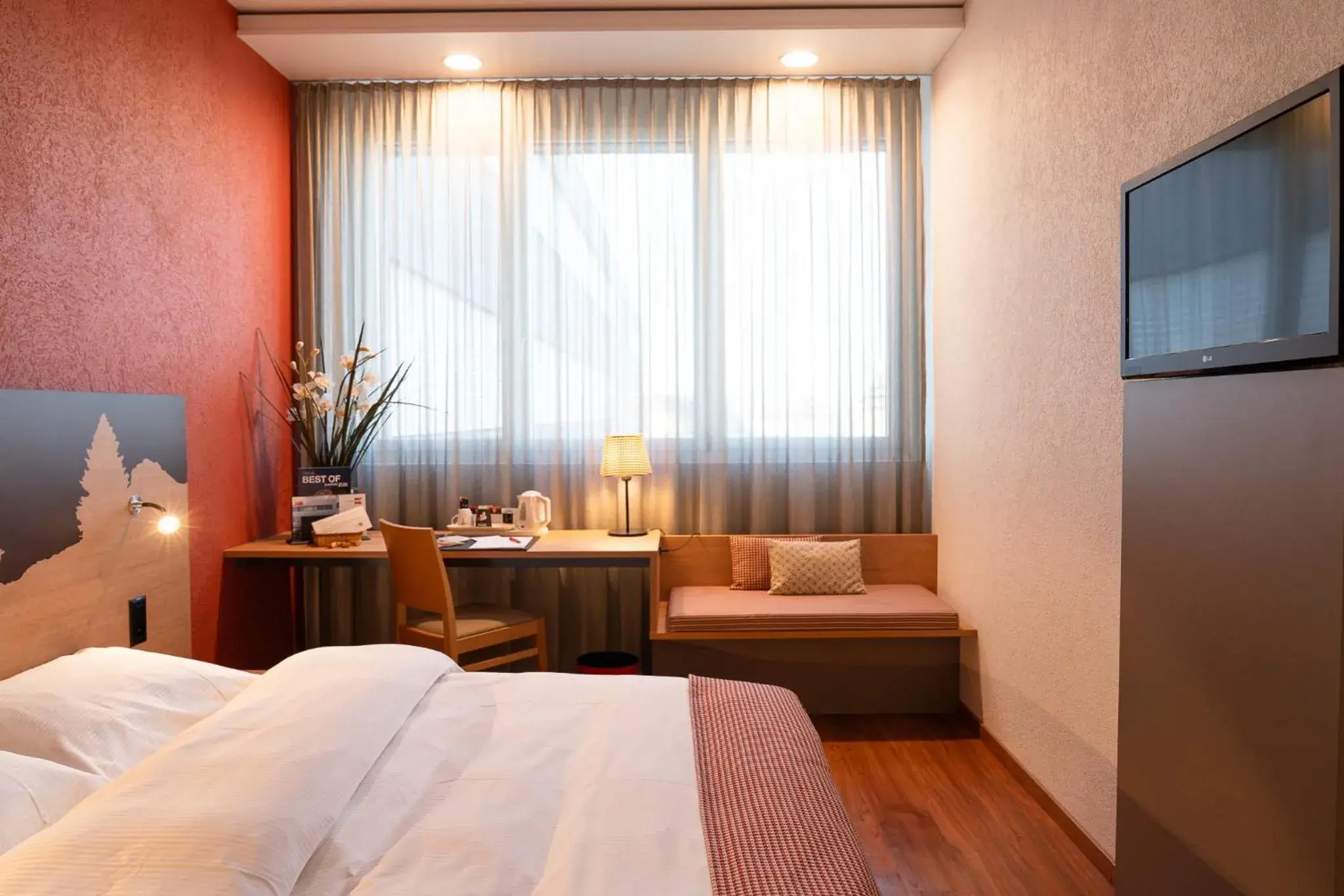 Bed in SwissEver Hotel Zug Bed in SwissEver Hotel Zug