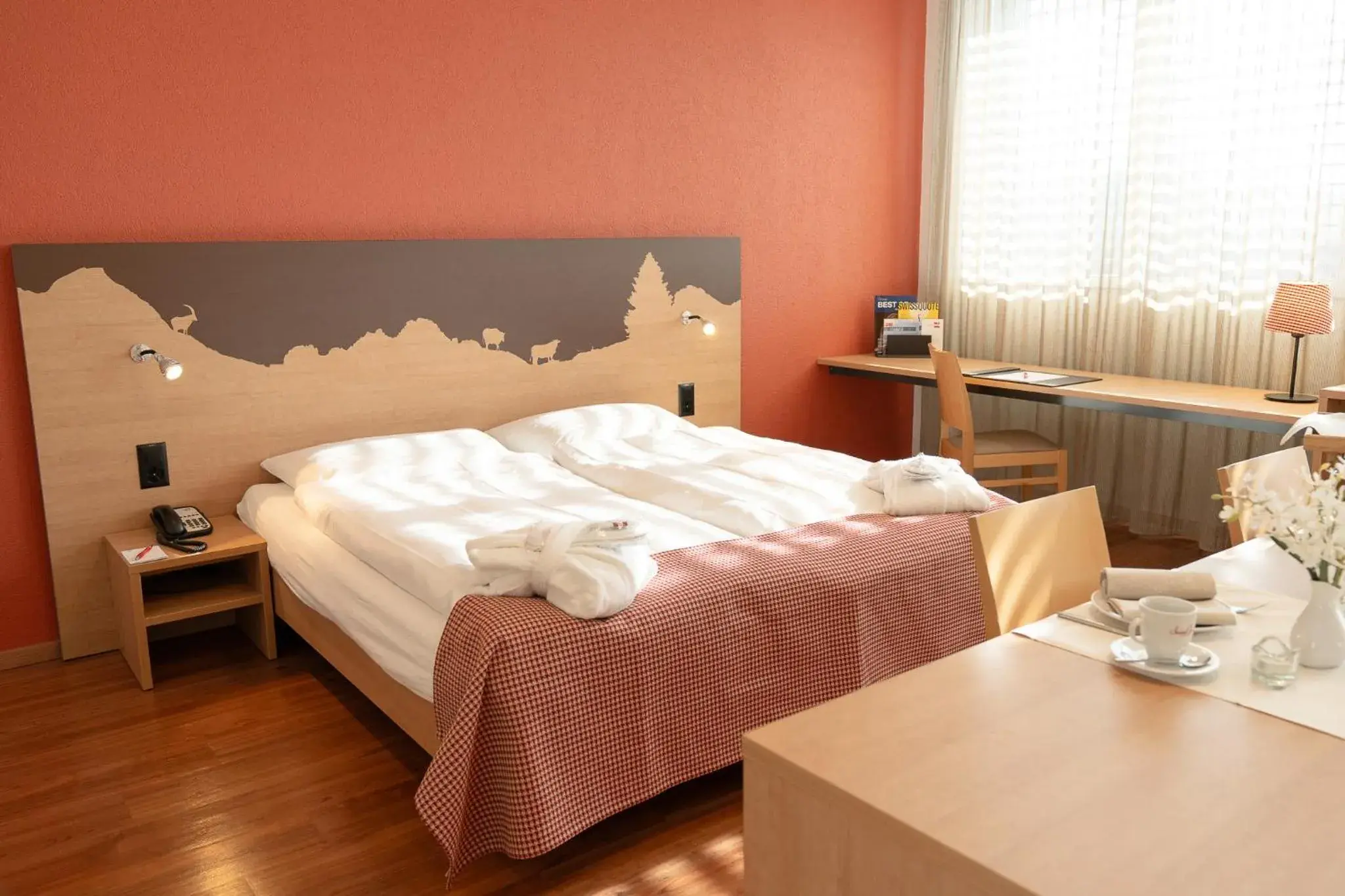 Bed in SwissEver Hotel Zug Bed in SwissEver Hotel Zug