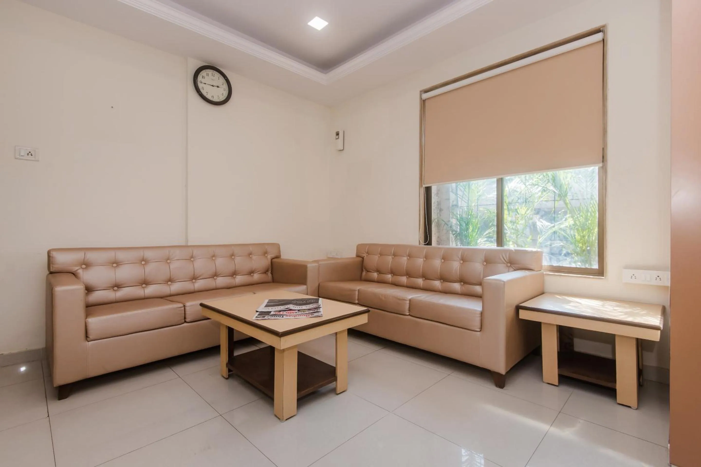 Bedroom in Capital O Orbit Inn Near Infiniti Mall