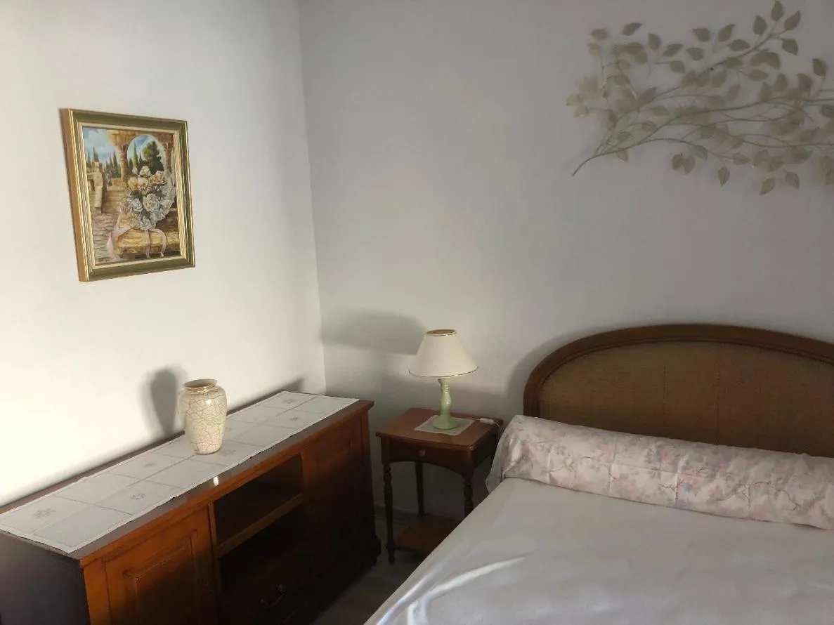 Bed in Hôtel de la Madeleine Anduze