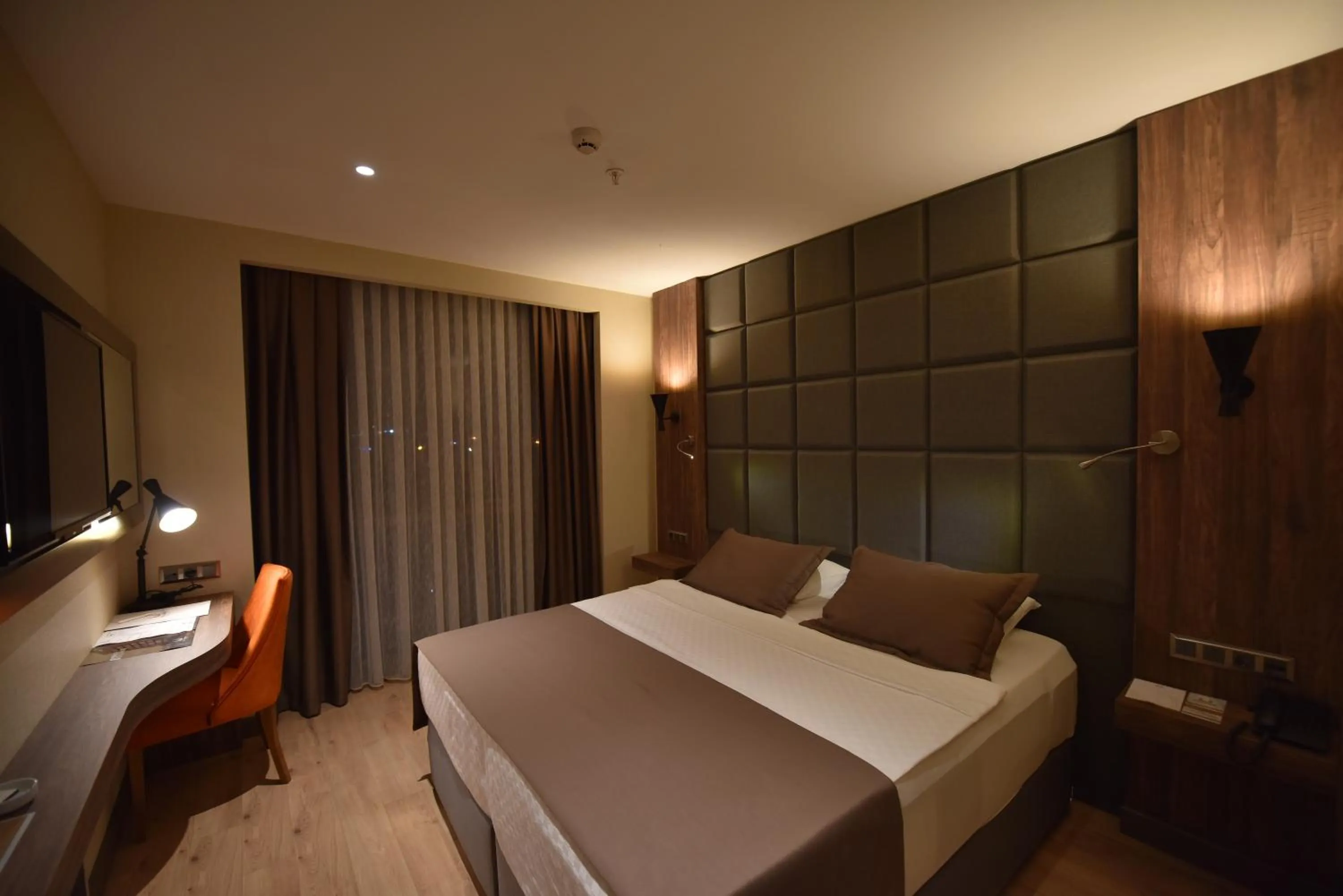 Bed in NEW KARAMAN HOTEL