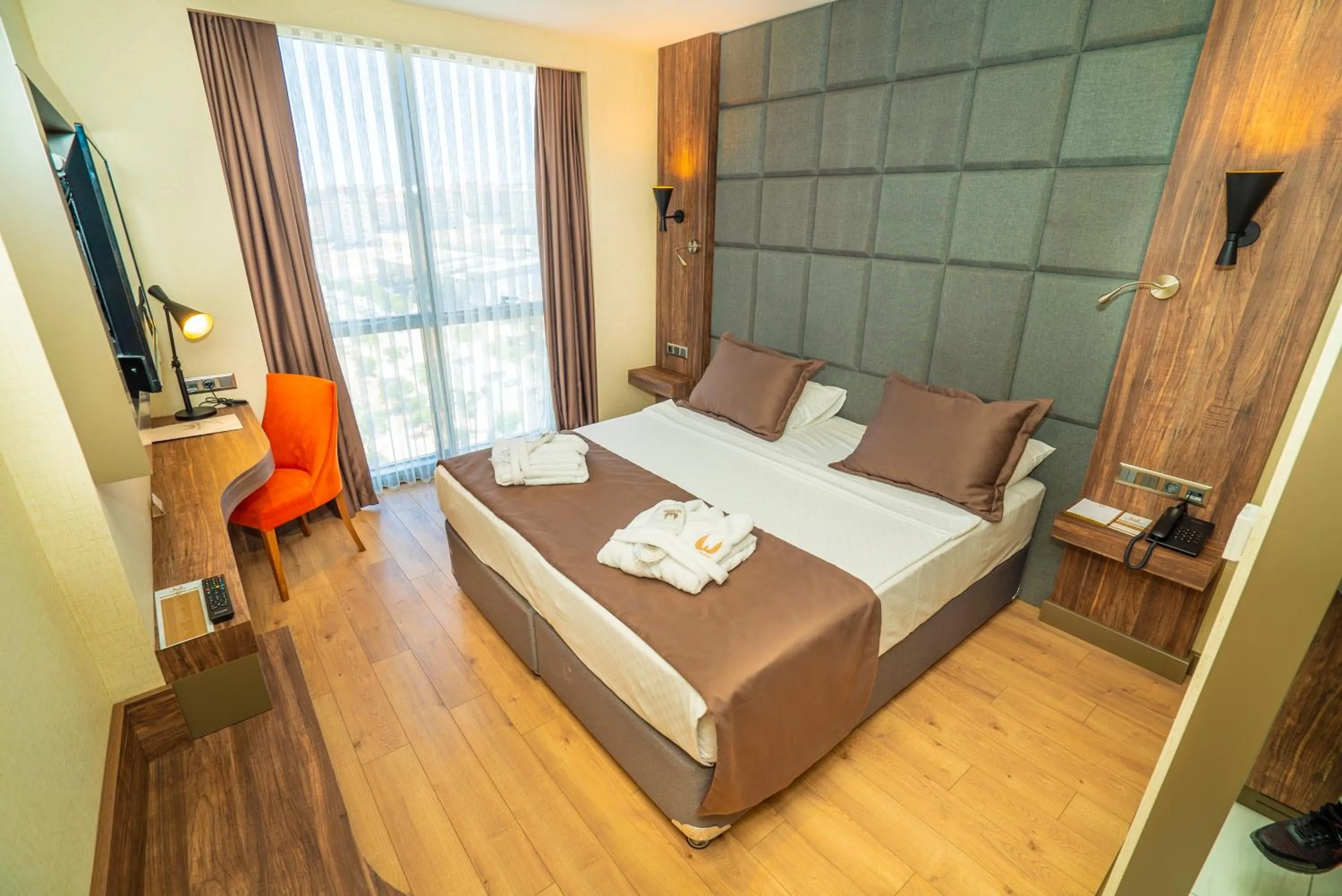 Bed in NEW KARAMAN HOTEL