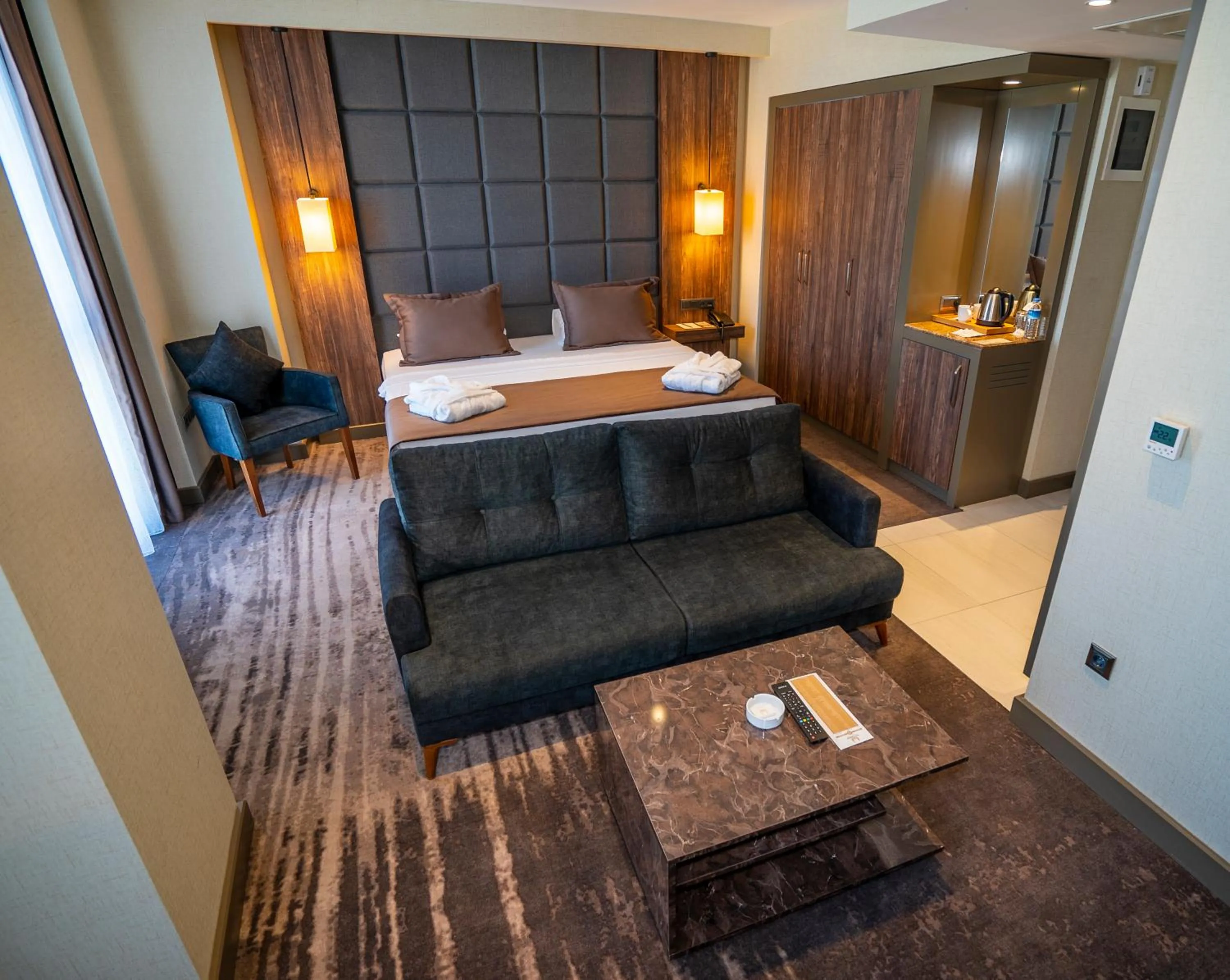 Bed in NEW KARAMAN HOTEL