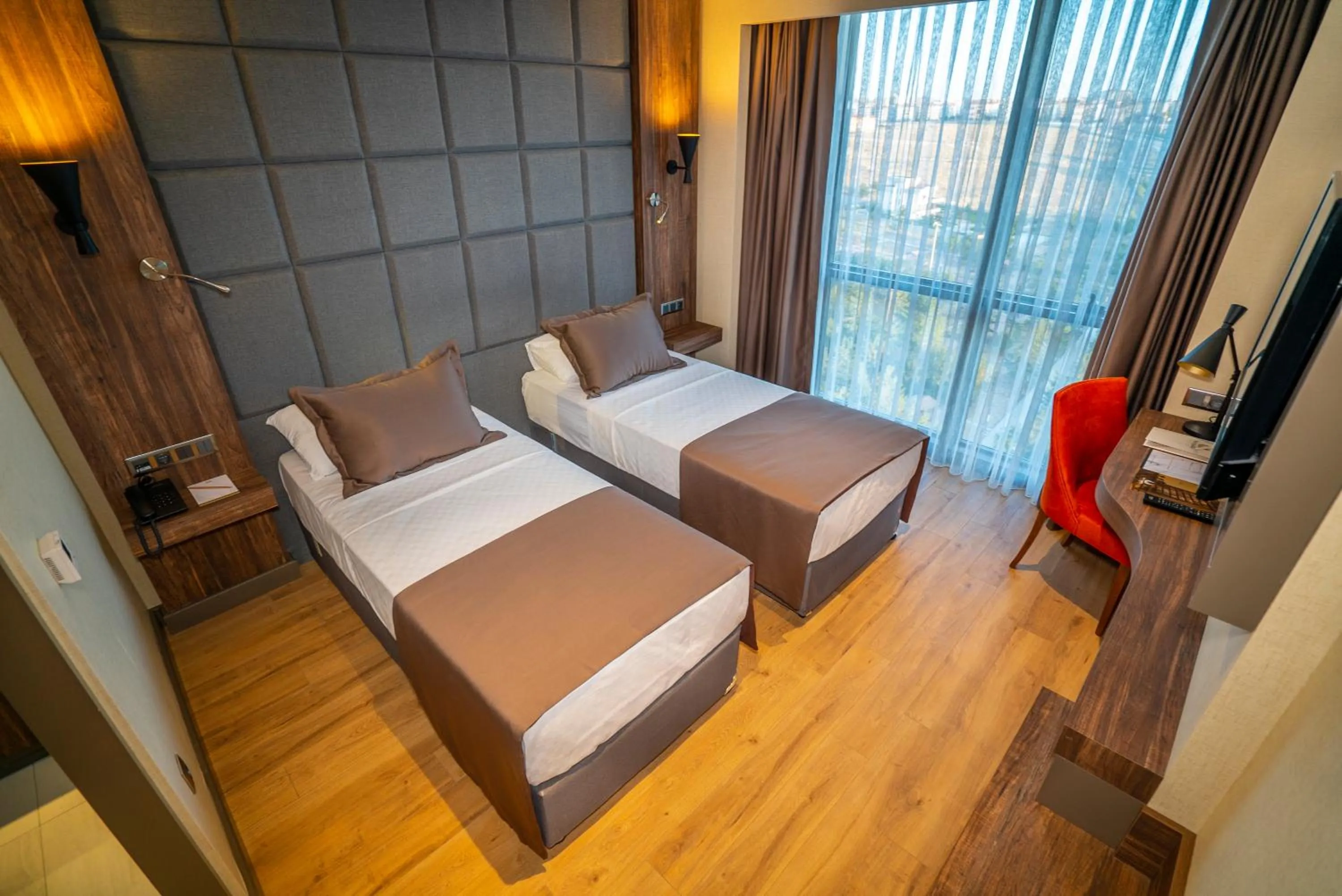 Bed in NEW KARAMAN HOTEL