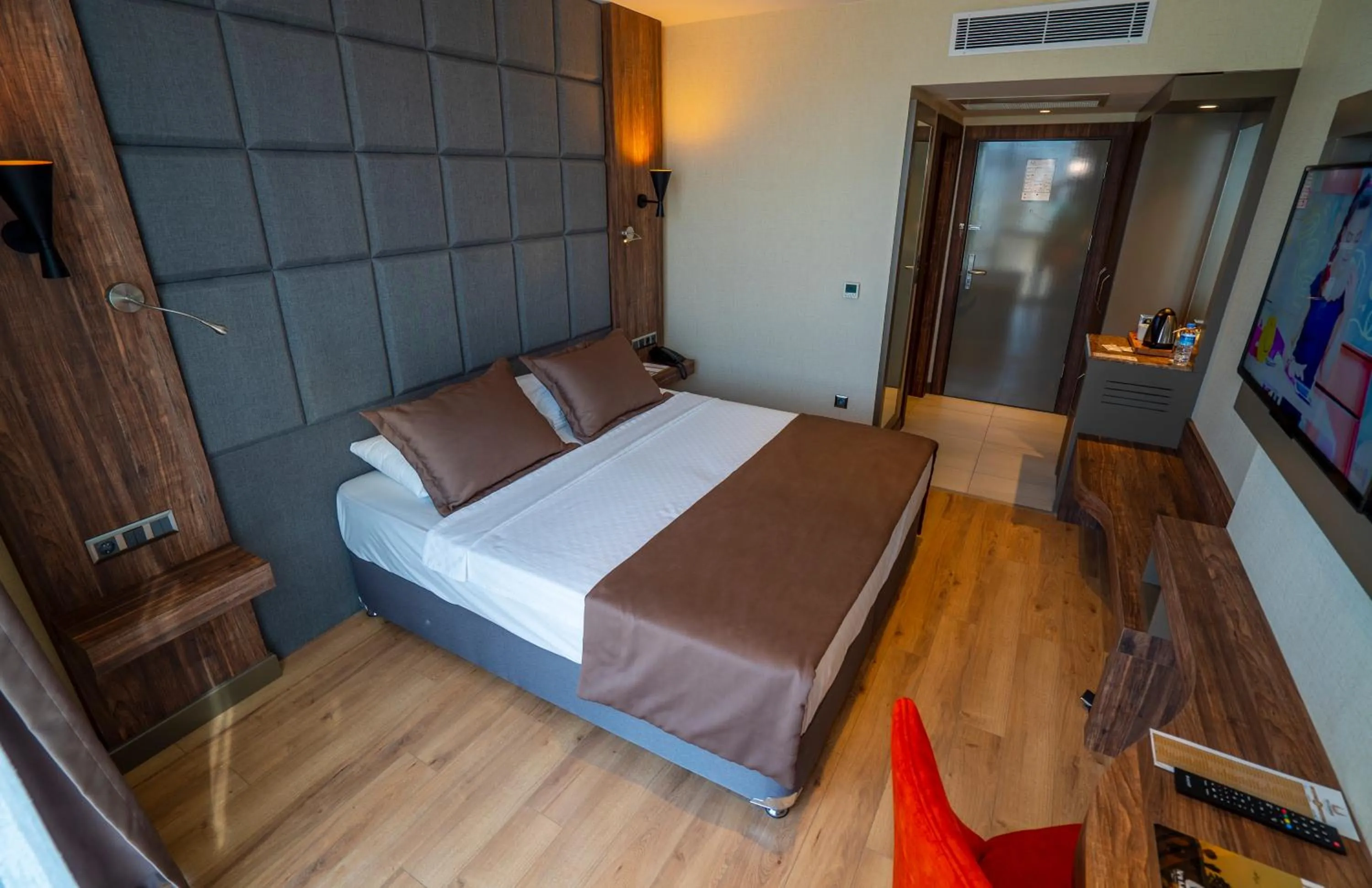 Bed in NEW KARAMAN HOTEL