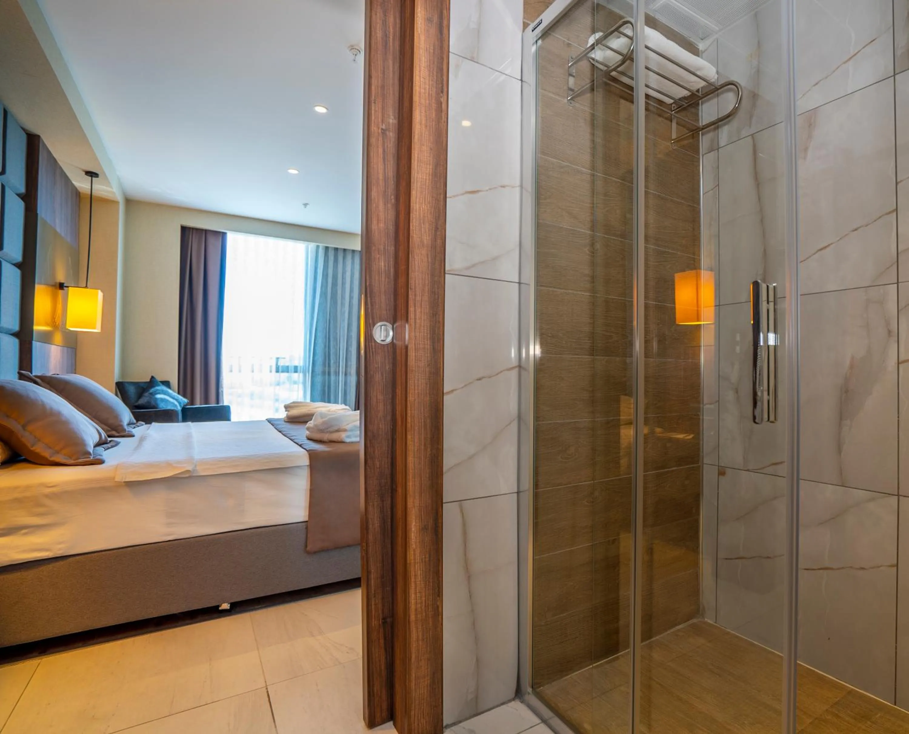 Bed in NEW KARAMAN HOTEL