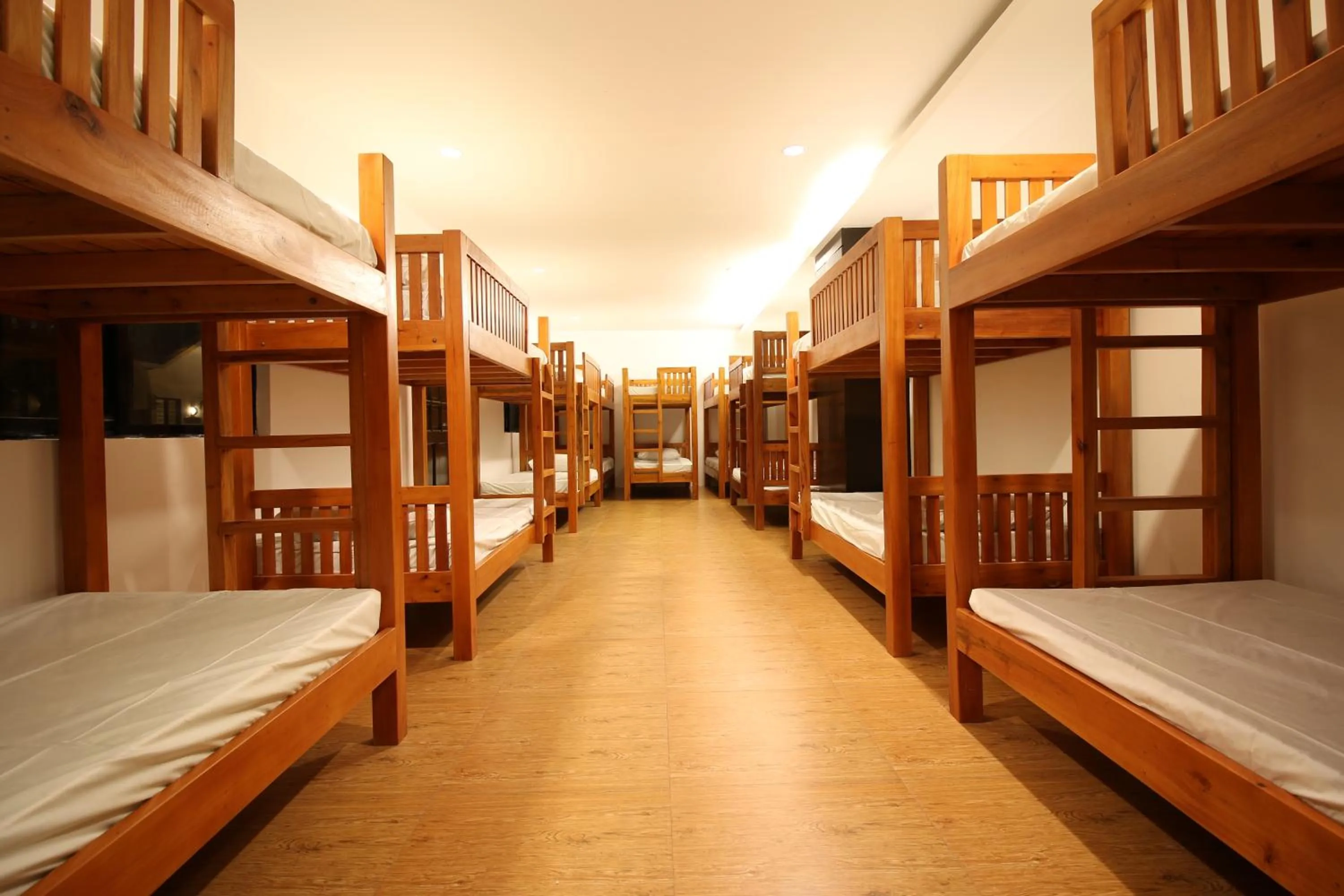 Bed in A&A Garden Suites