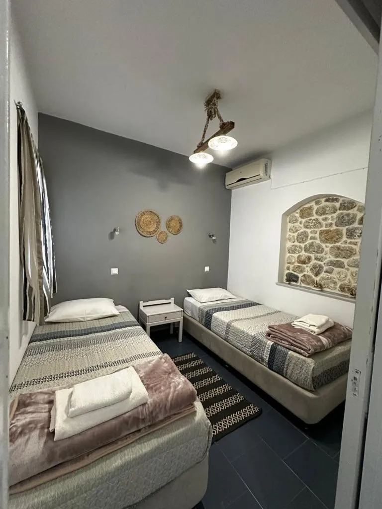 Bed in Elenis Studios&Apartments