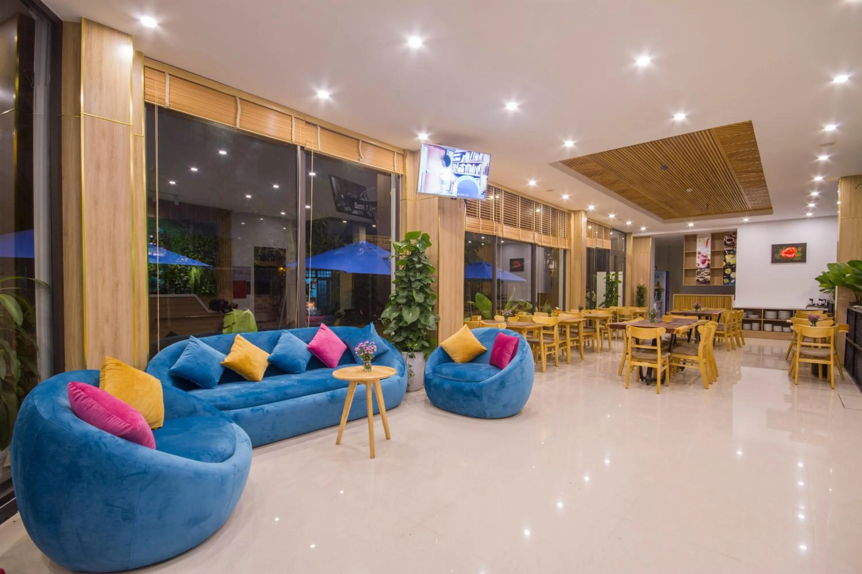 Communal lounge/ TV room in King House Villa Hotel & Spa