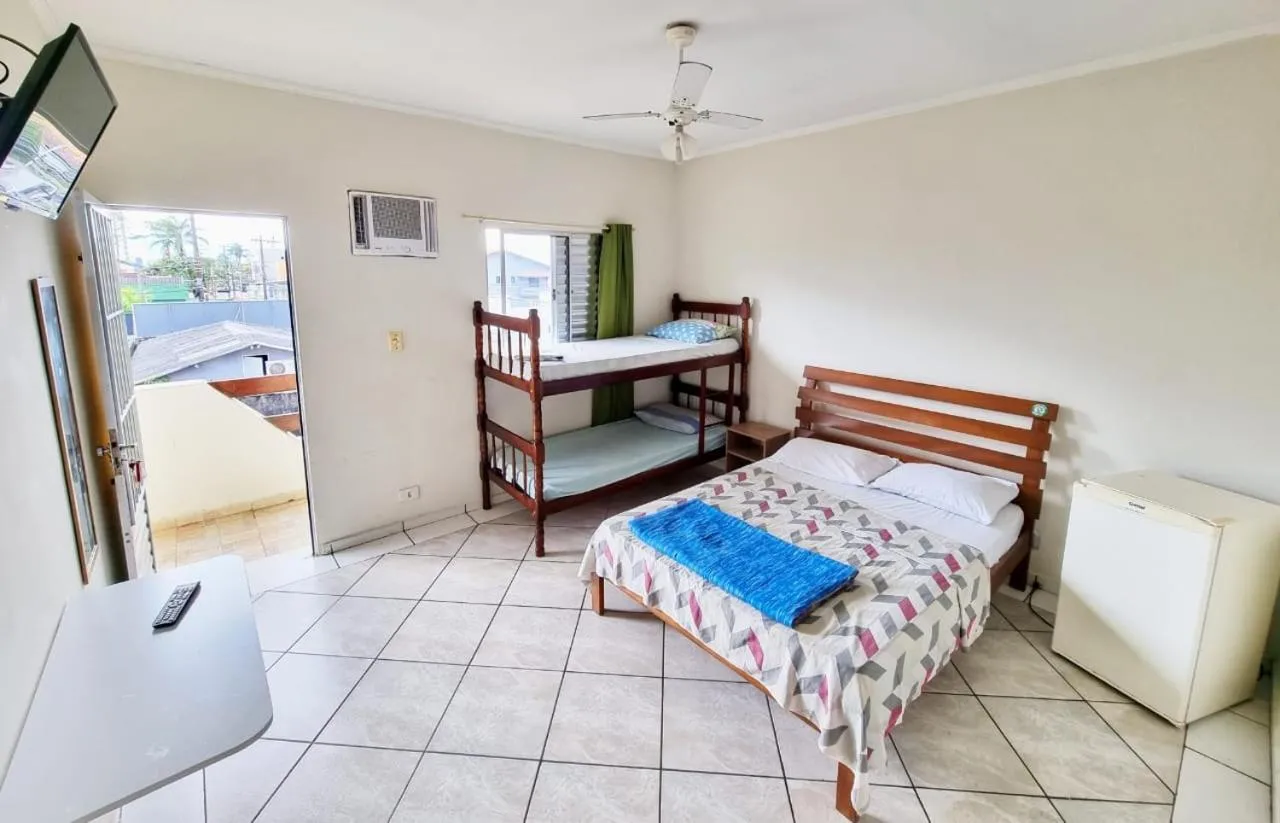 Bed in Pousada Aconchego