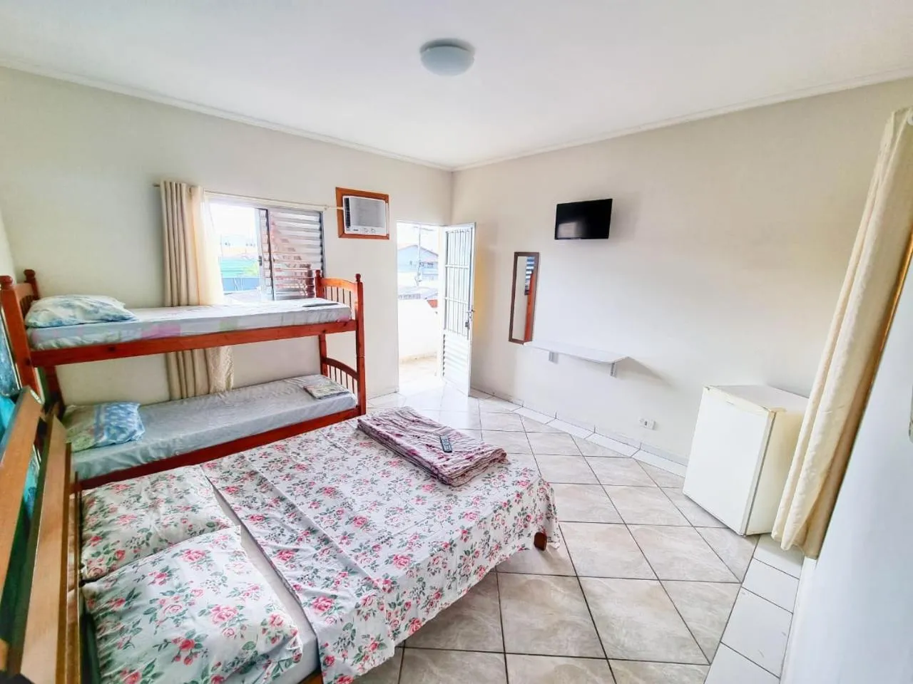 Bed in Pousada Aconchego