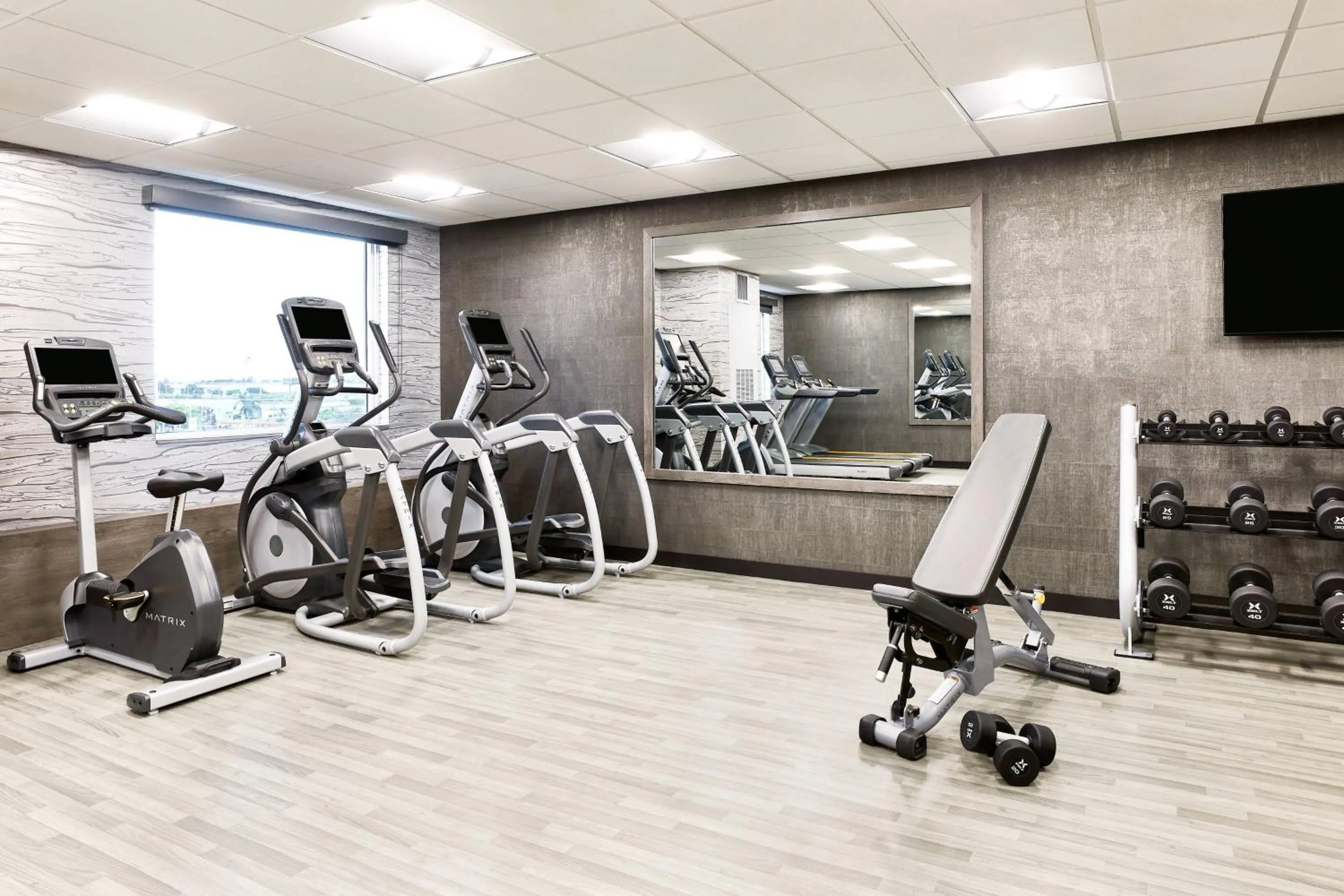 Fitness centre/facilities in AC Hotel by Marriott Miami Airport West/Doral
