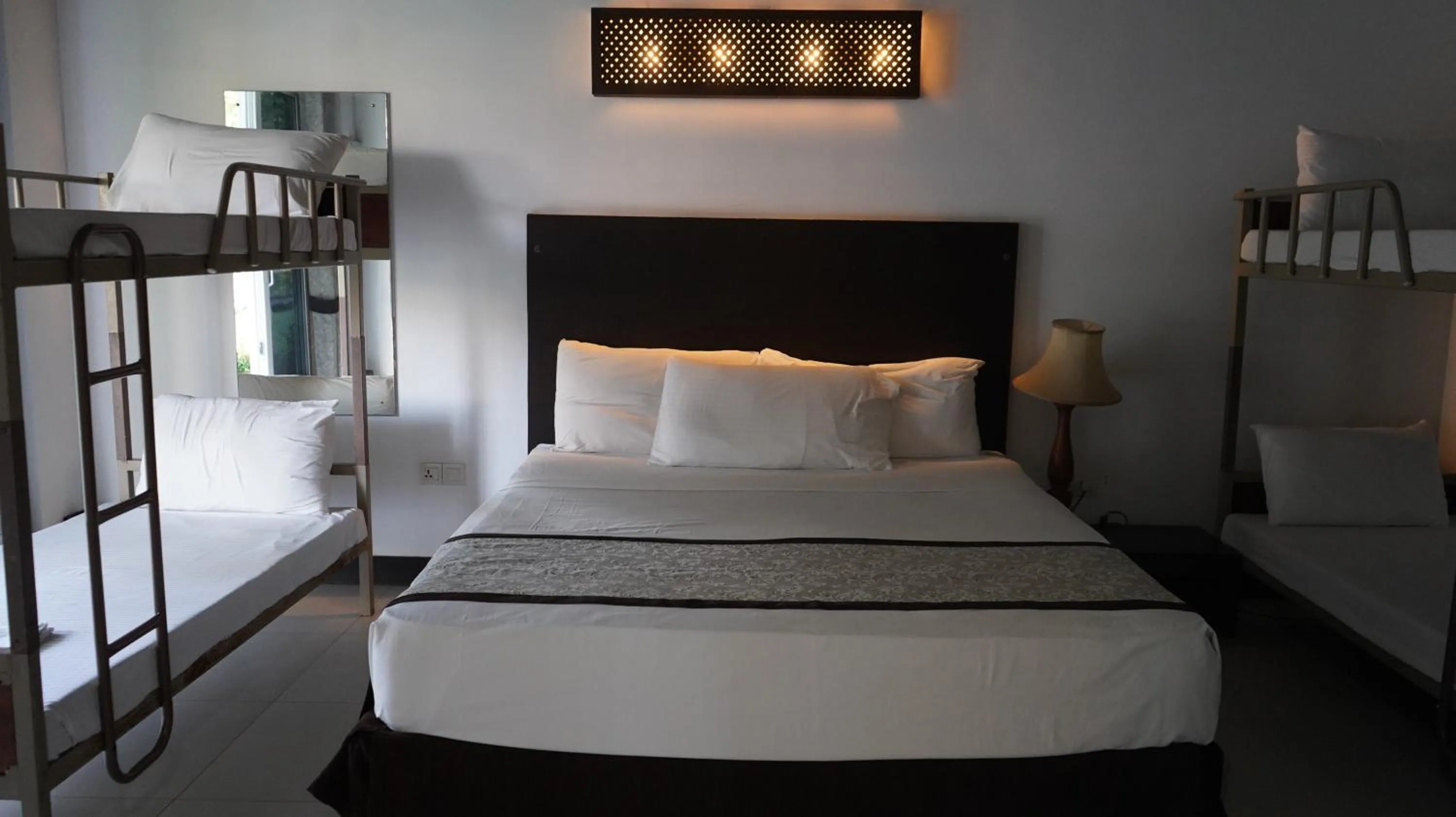 Photo of the whole room, Bed in Amaluna Resorts