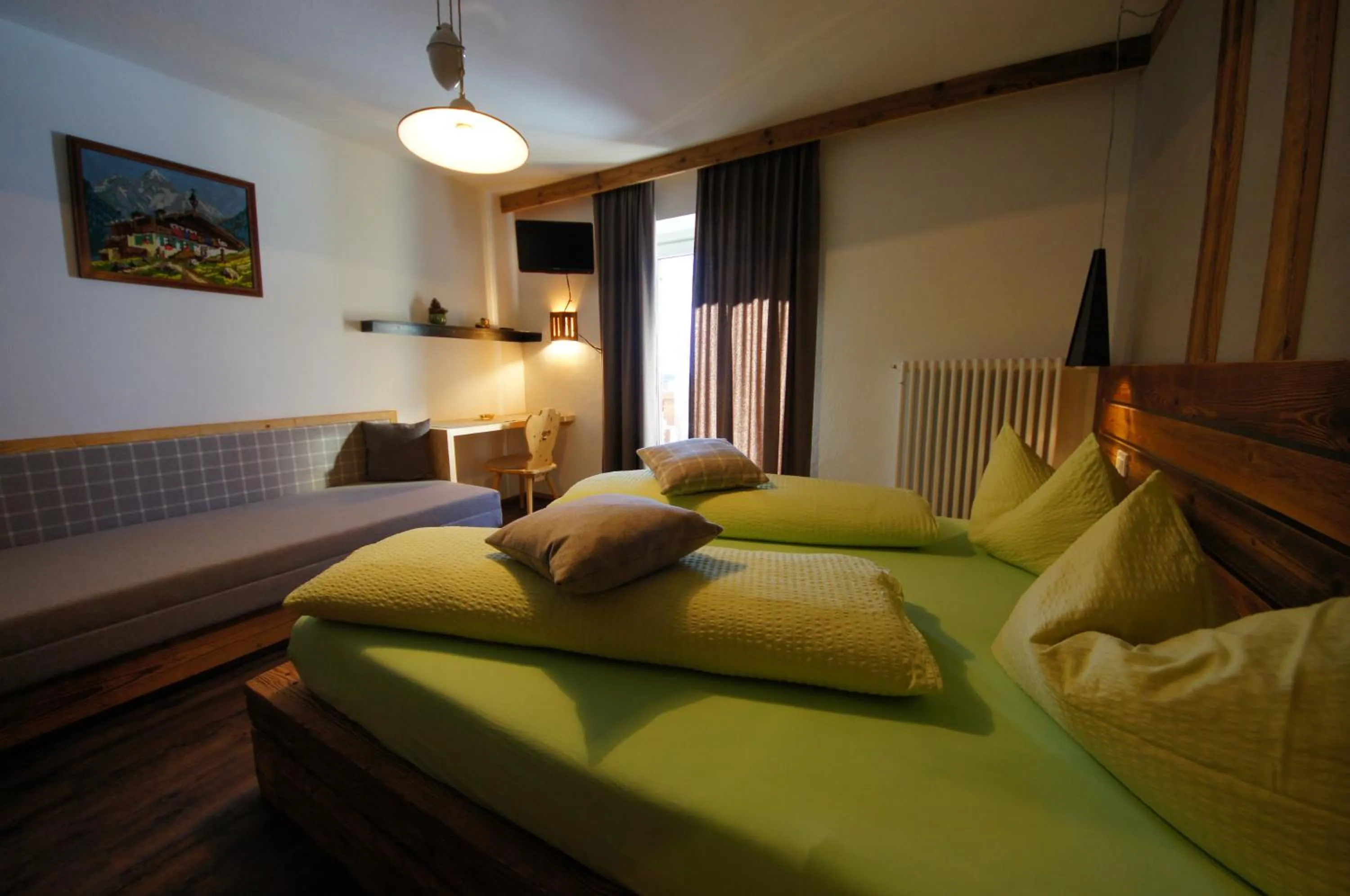 Bedroom in Appartamenti Residence Pars