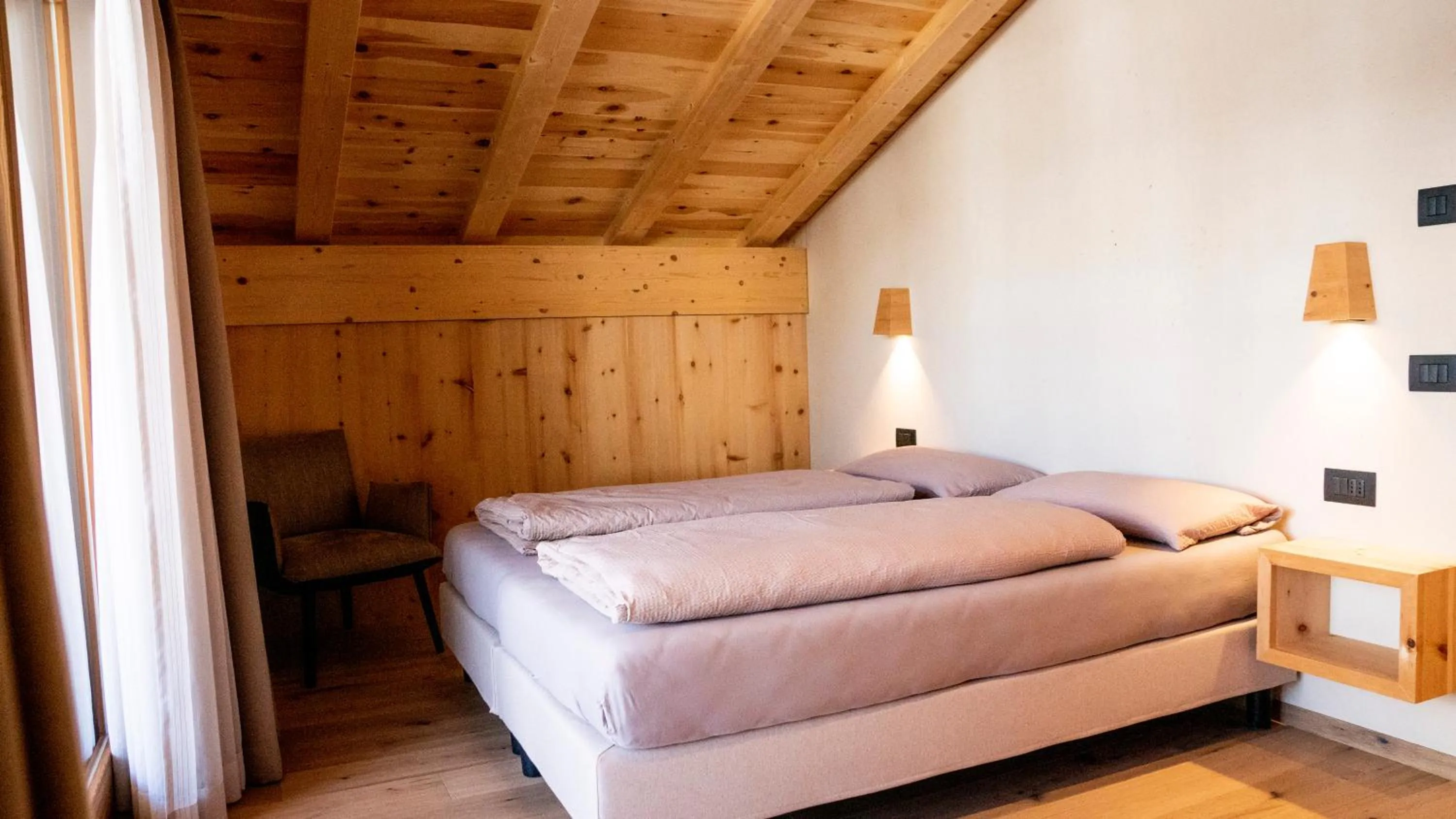 Bedroom in Appartamenti Residence Pars