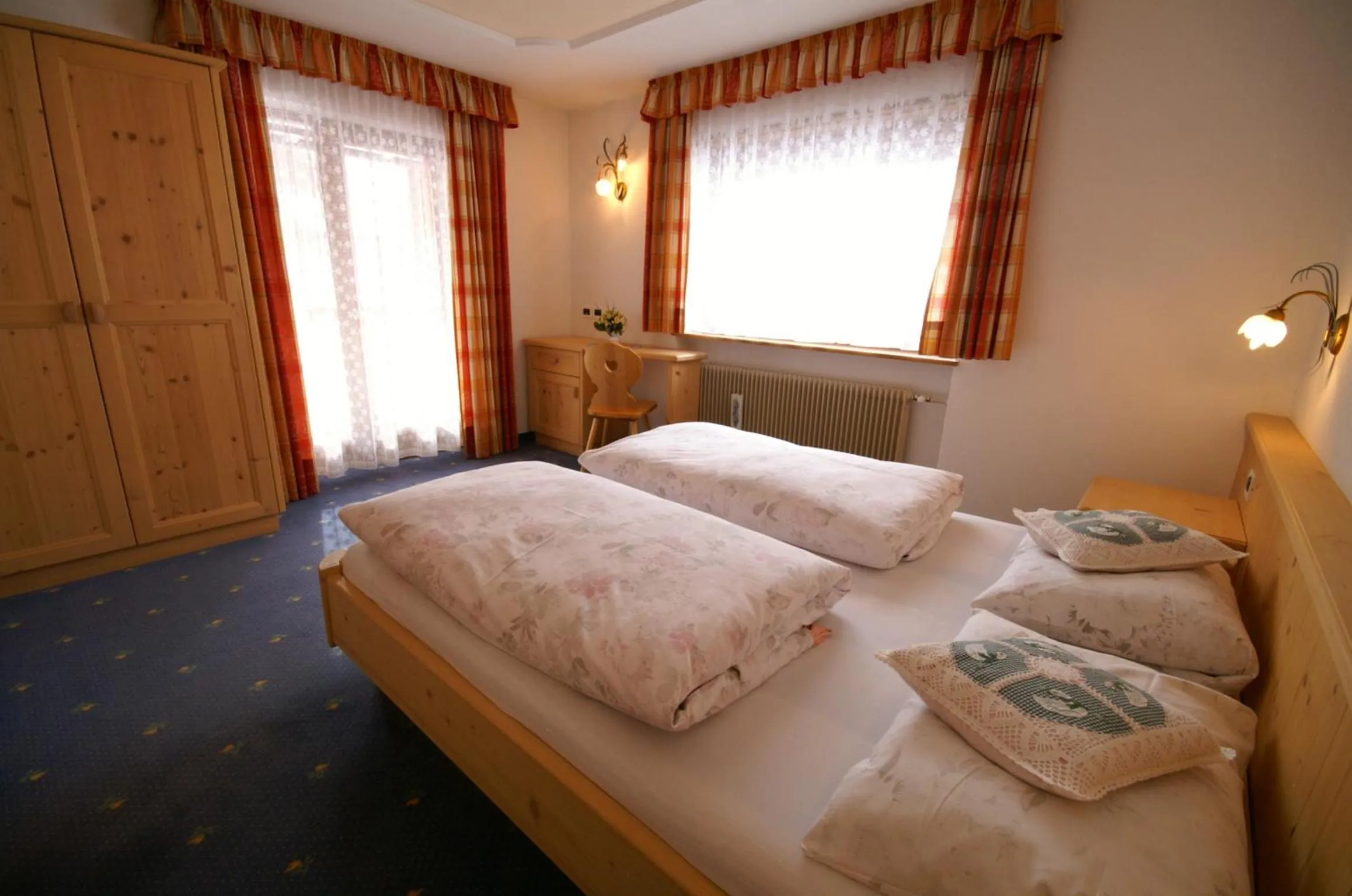 Bedroom in Appartamenti Residence Pars