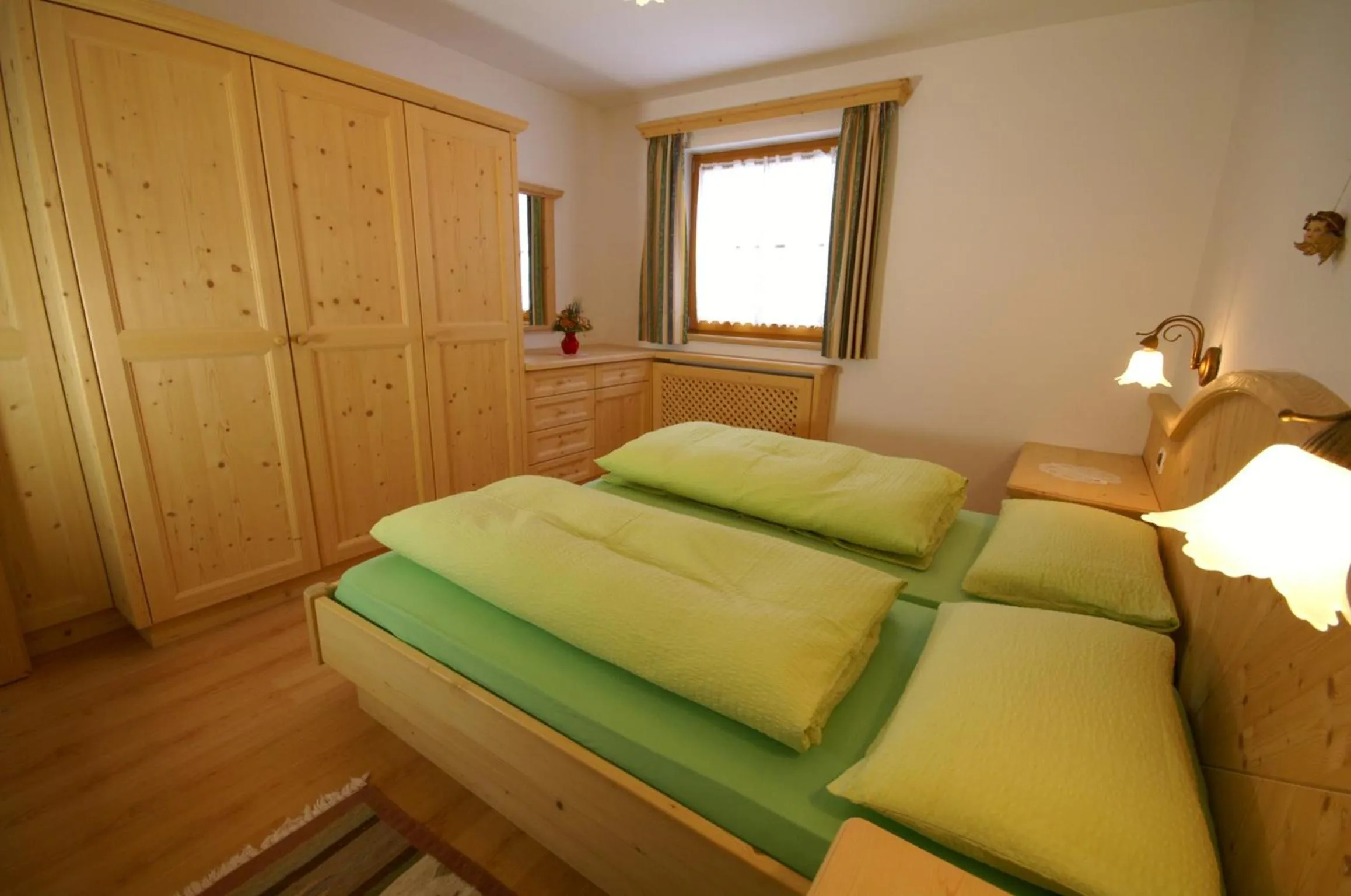 Bedroom in Appartamenti Residence Pars