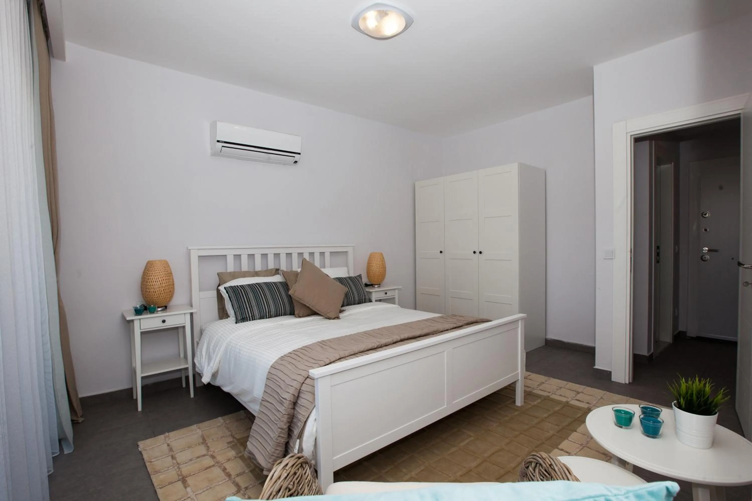 Bed in Truemar Hotels & Suites