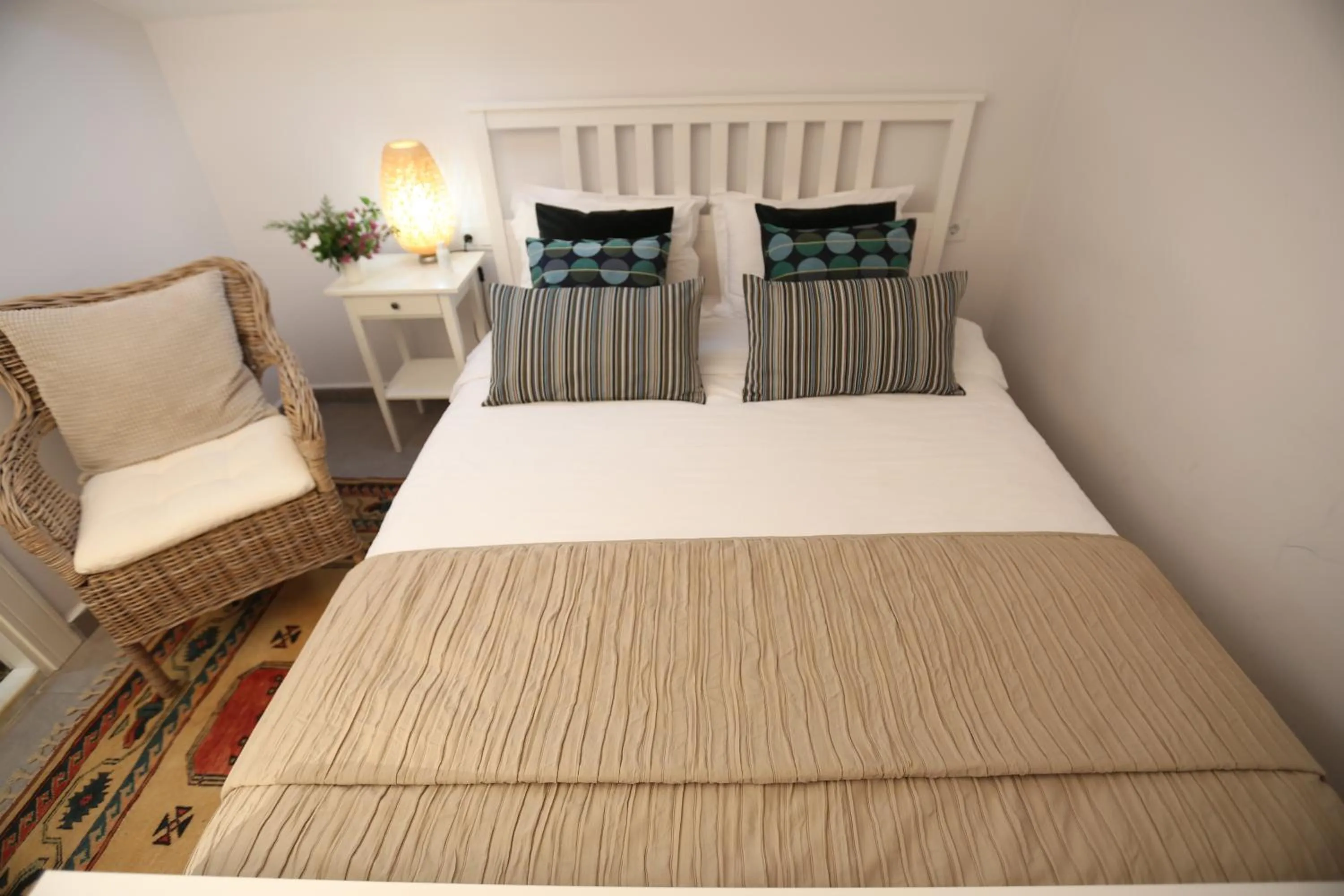 Bed in Truemar Hotels & Suites