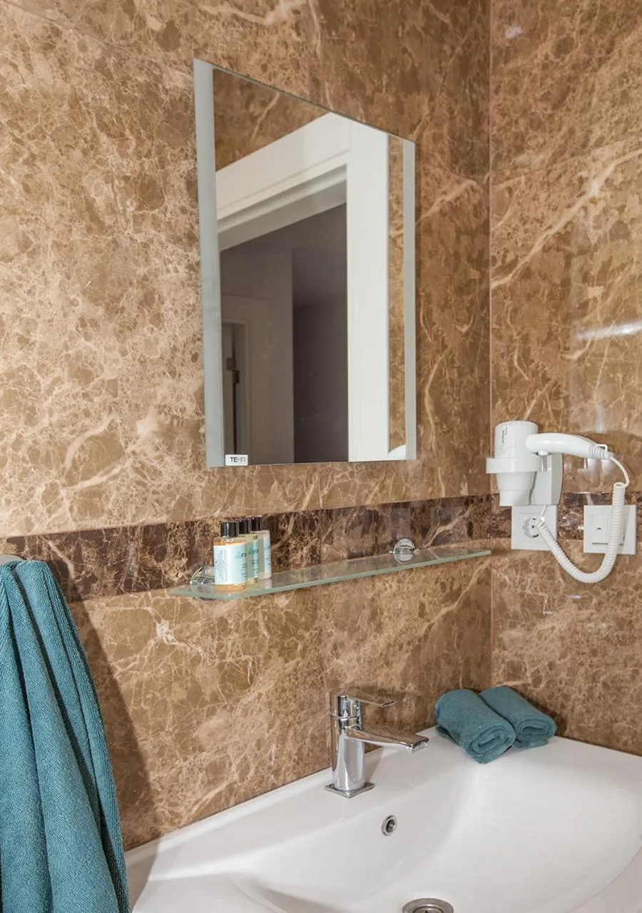 Shower in Truemar Hotels & Suites
