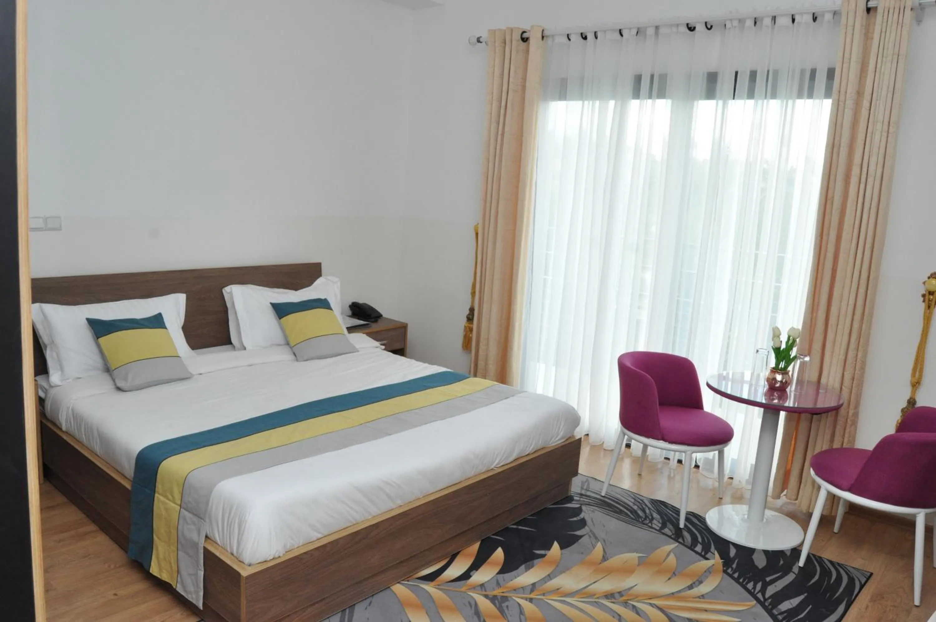 Bed in Hôtel Sky blue Mada