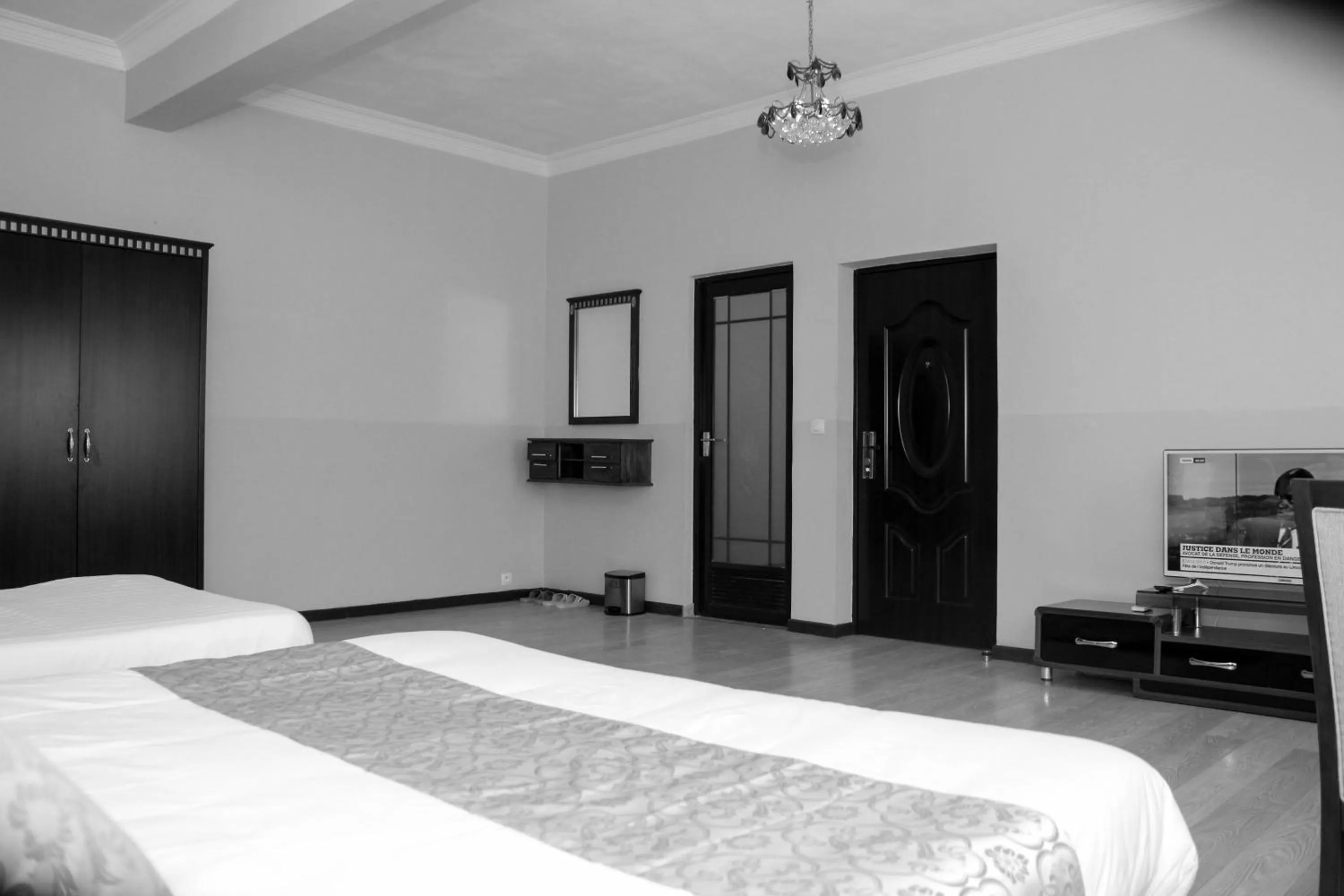 Photo of the whole room, Bed in Hôtel Sky blue Mada