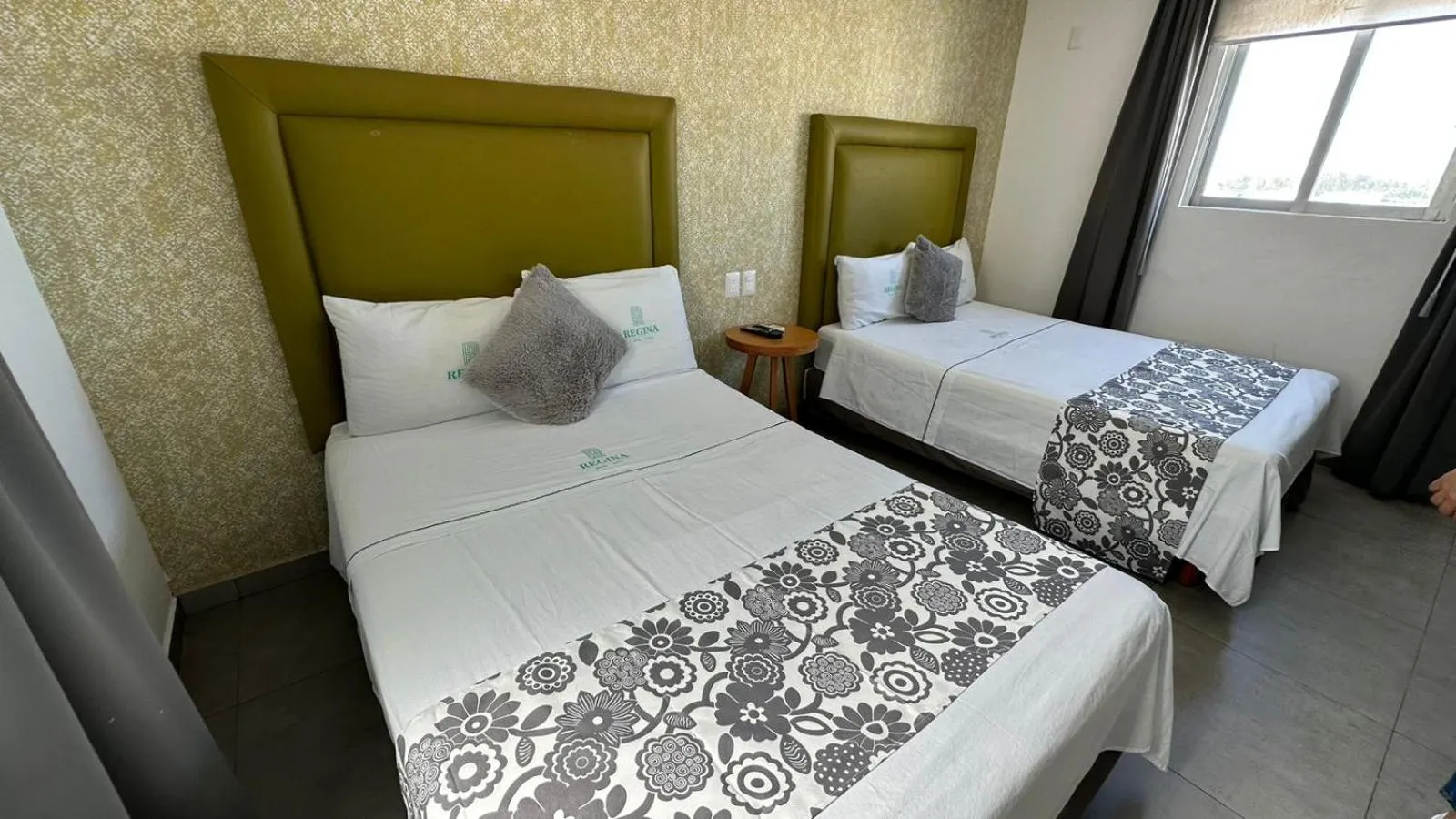 Bed in Hotel Suites Regina