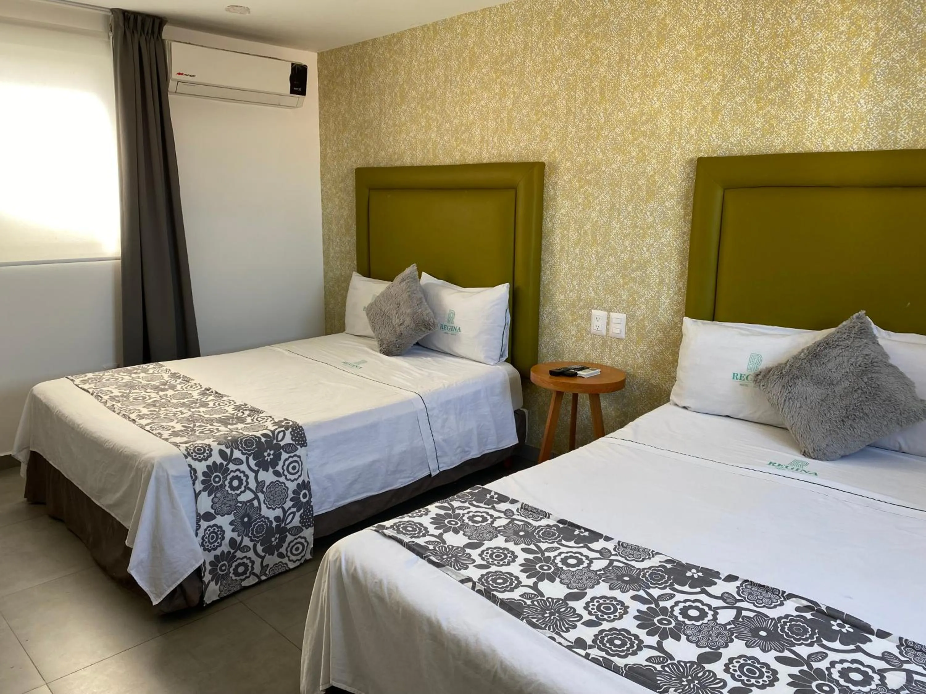 Bed in Hotel Suites Regina