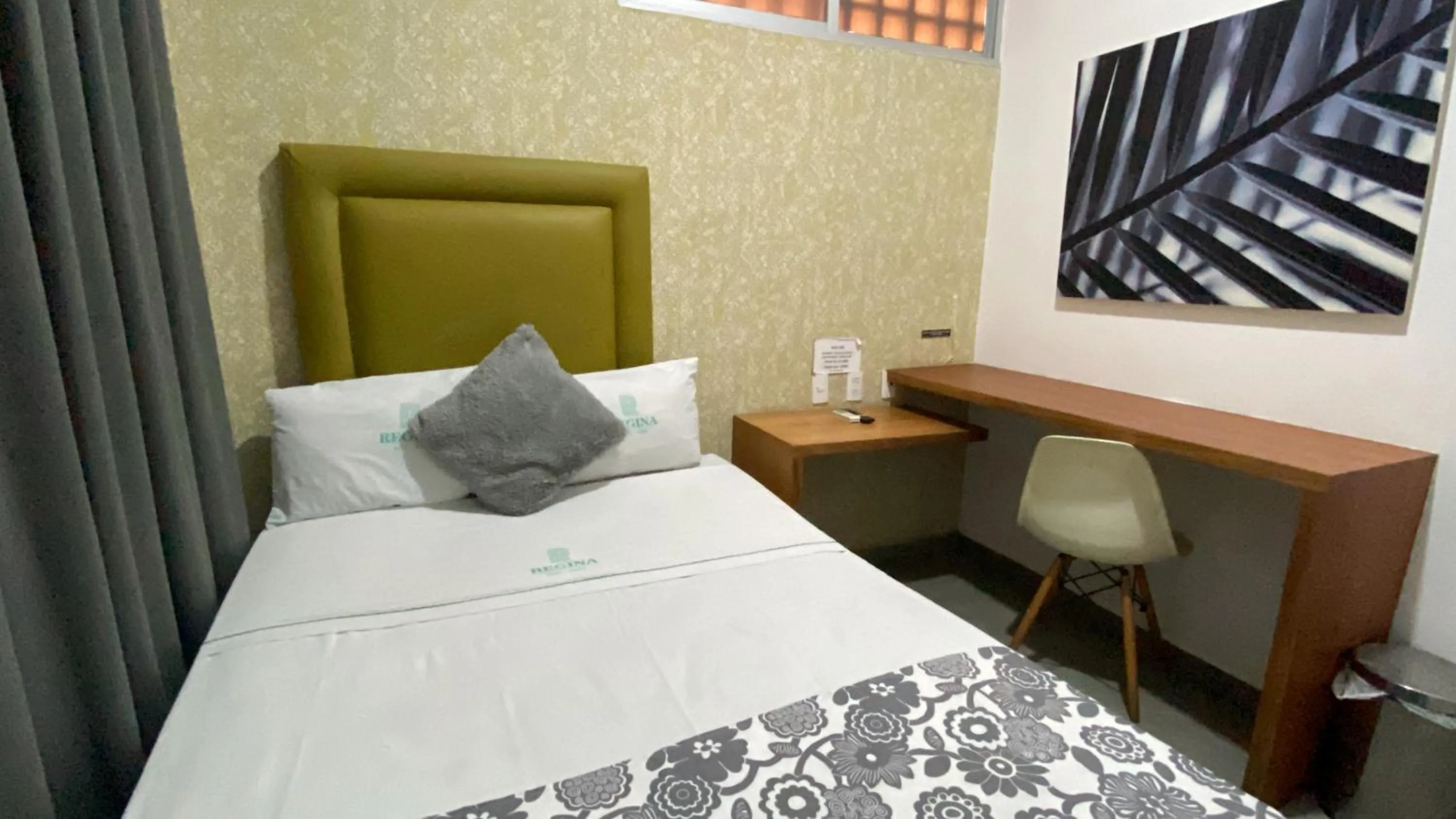 Bed in Hotel Suites Regina