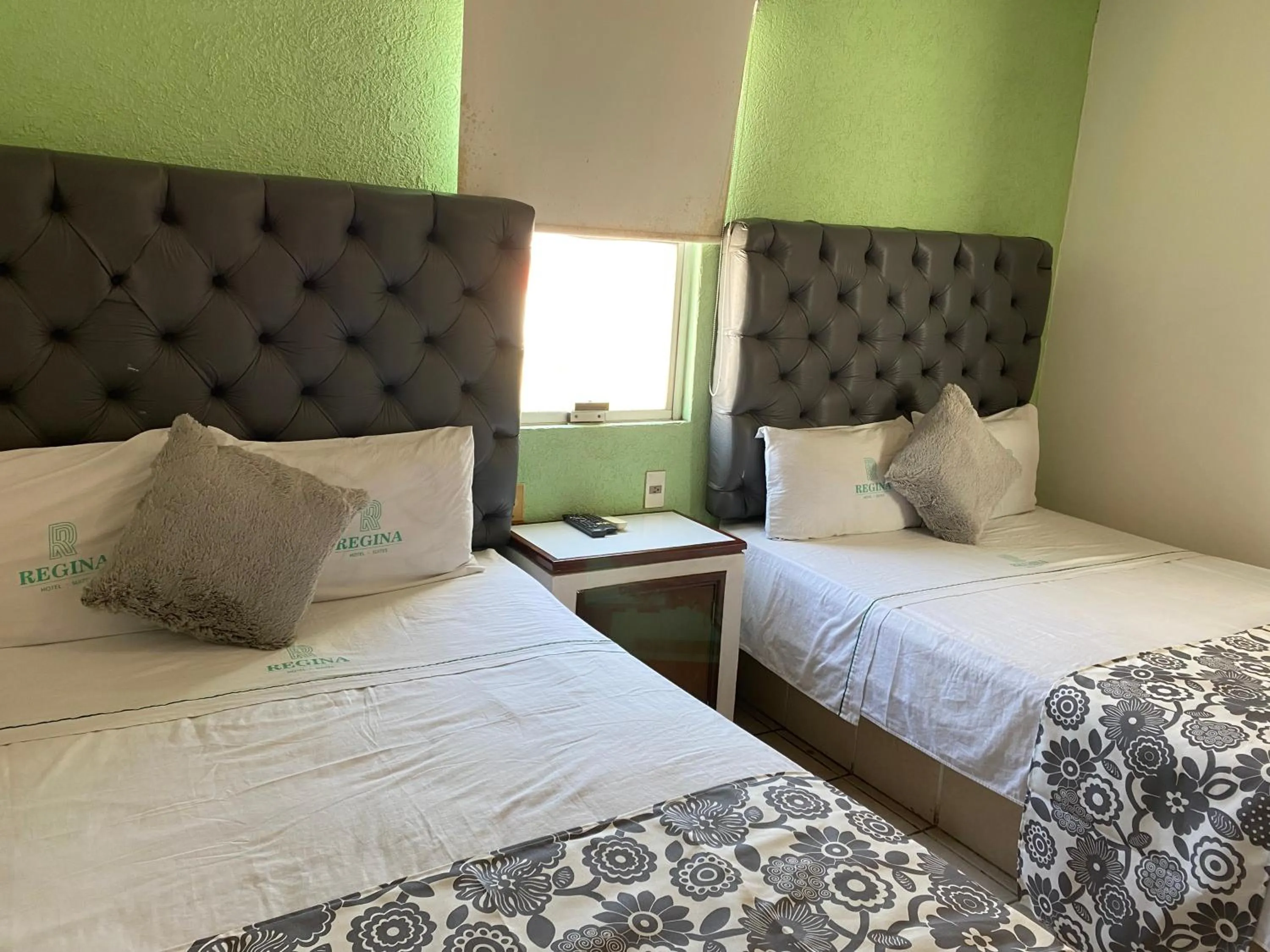 Bed in Hotel Suites Regina