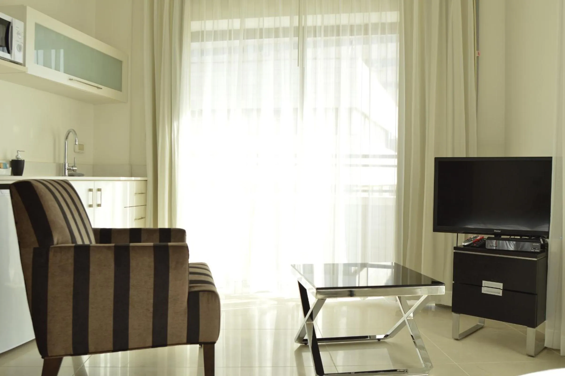 TV and multimedia, TV/Entertainment Center in Shamai Suites Jerusalem