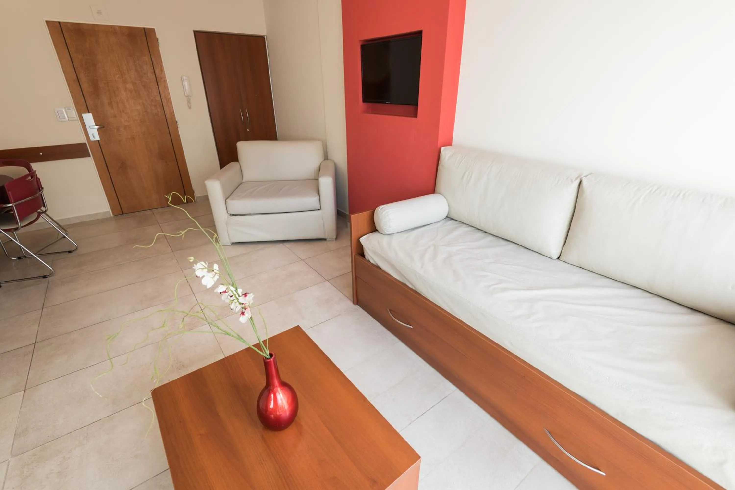Seating area, Bed in Apart Hotel Independencia - Luz y Fuerza Patagonia