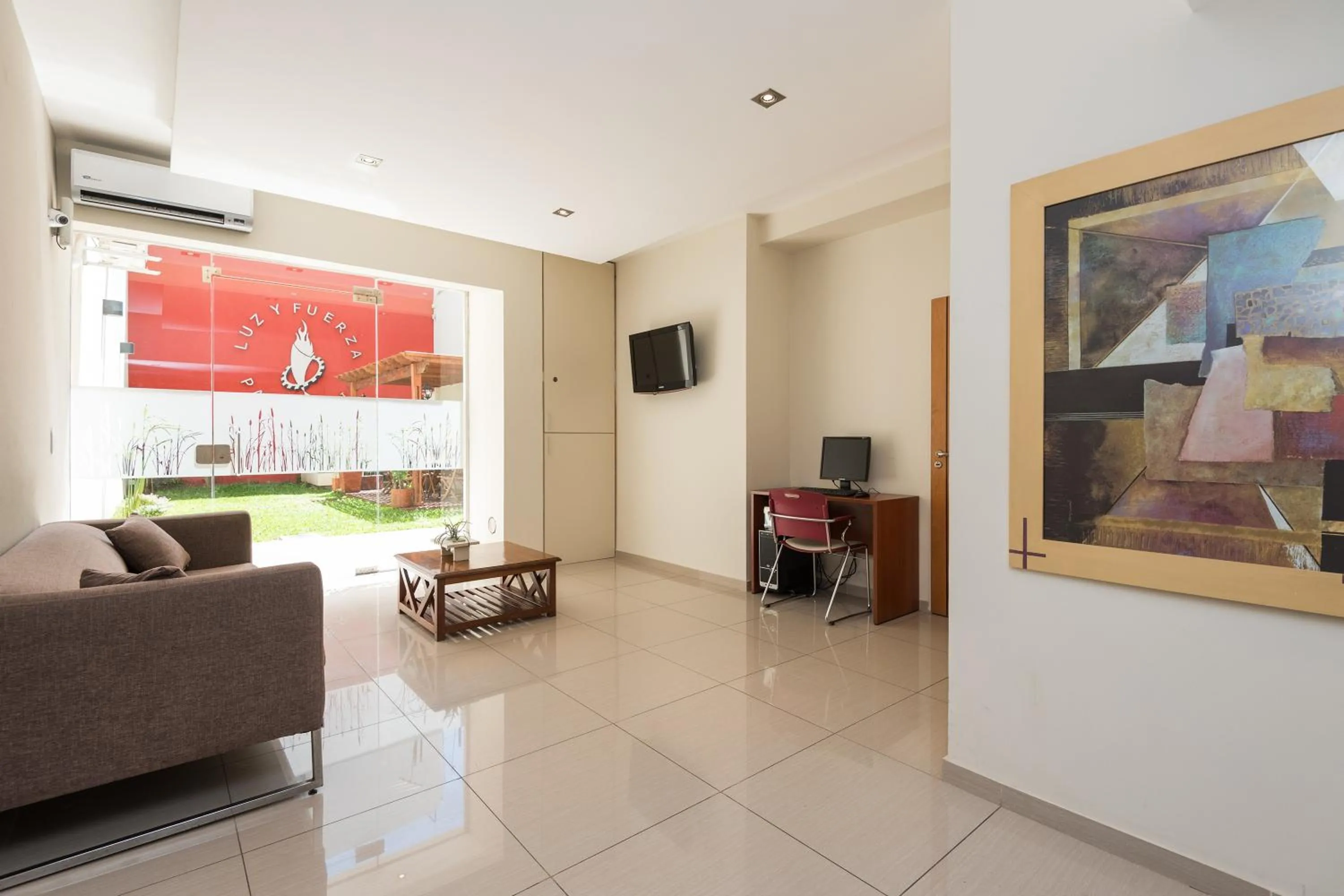 Communal lounge/ TV room in Apart Hotel Independencia - Luz y Fuerza Patagonia