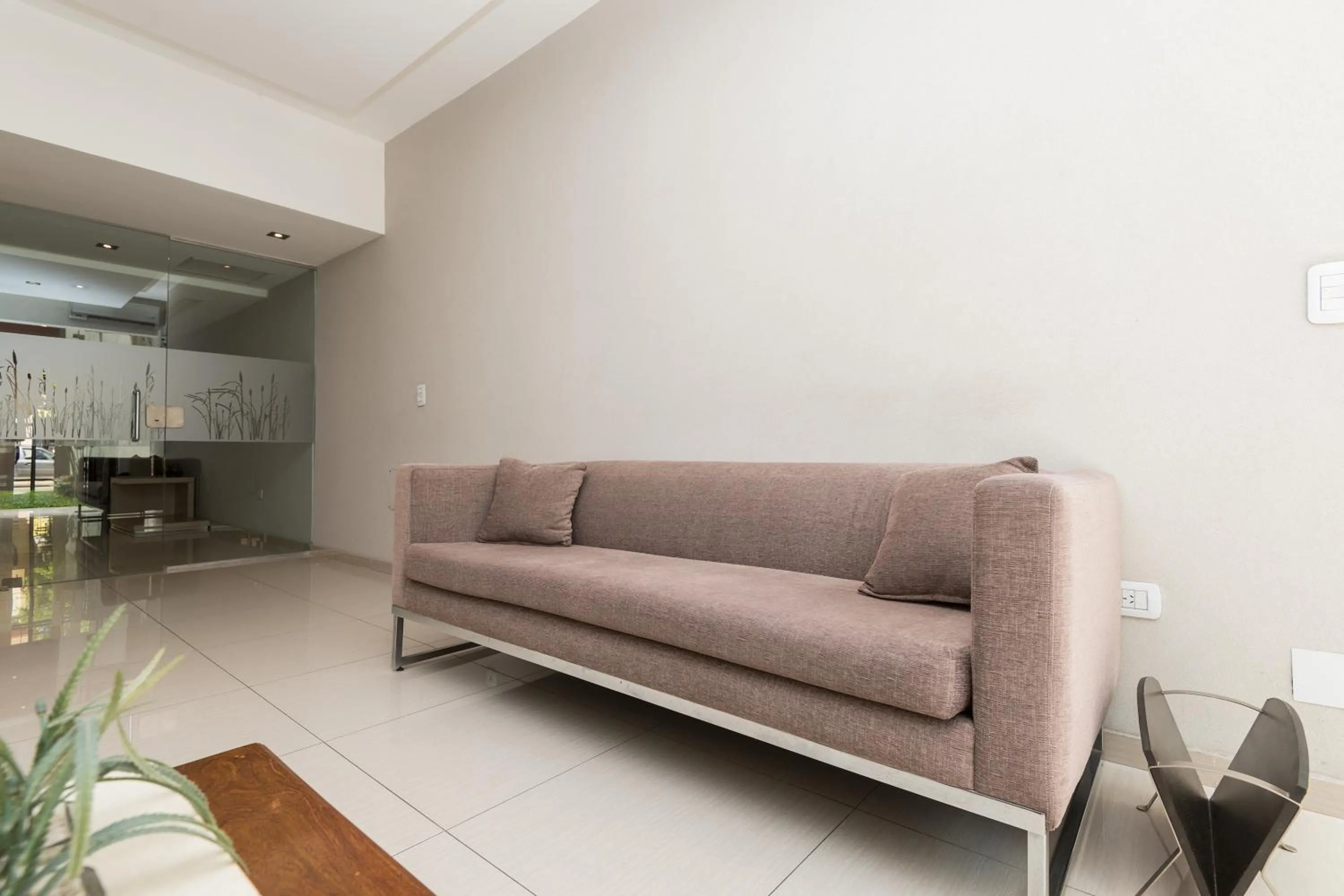 Communal lounge/ TV room in Apart Hotel Independencia - Luz y Fuerza Patagonia